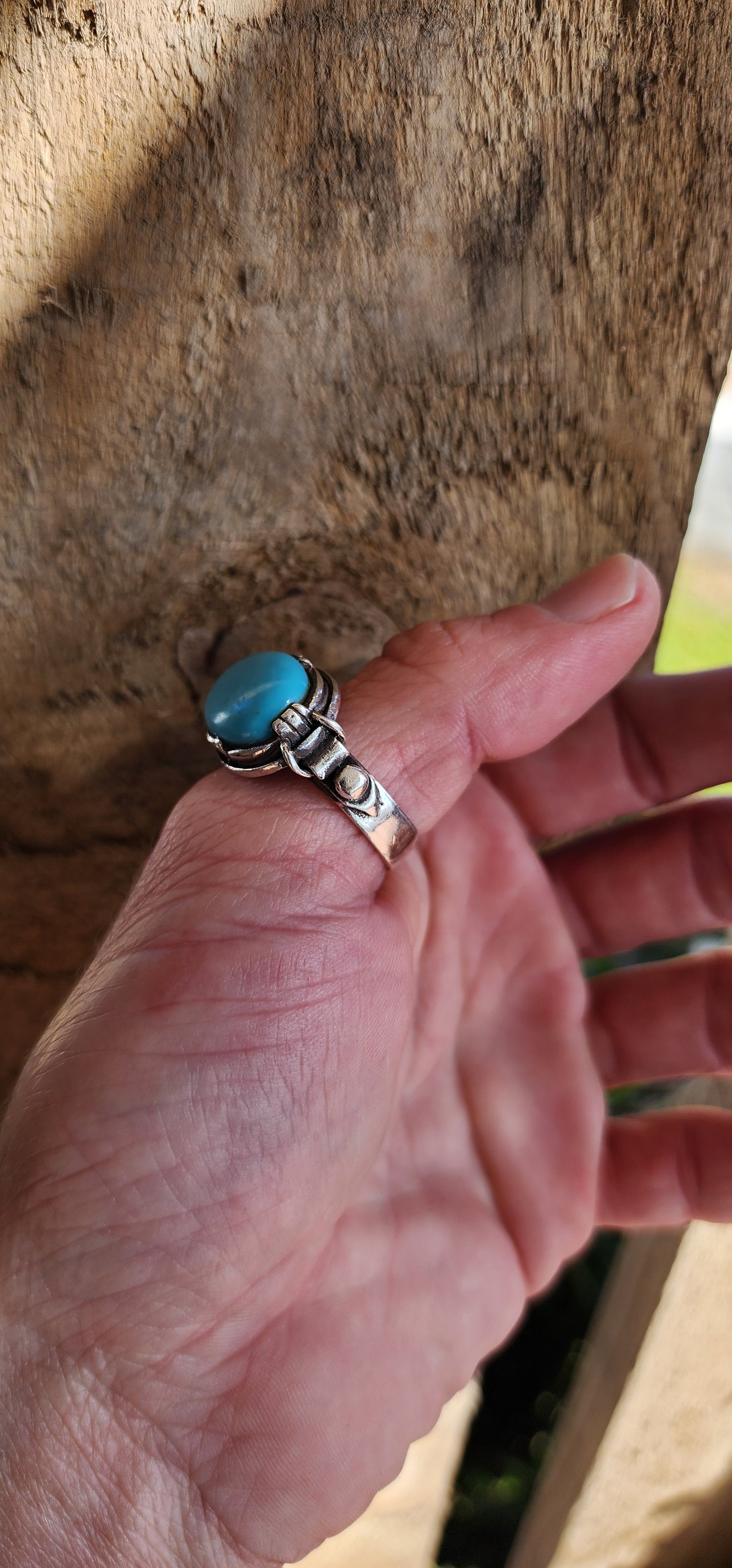 Increbidly beautiful Sterling Silver Artisan made unisex ring , featuring the most beautiful Robins Egg Blue Turquoise Cabochon , claw set in an raised basket with highly ornate shoulders