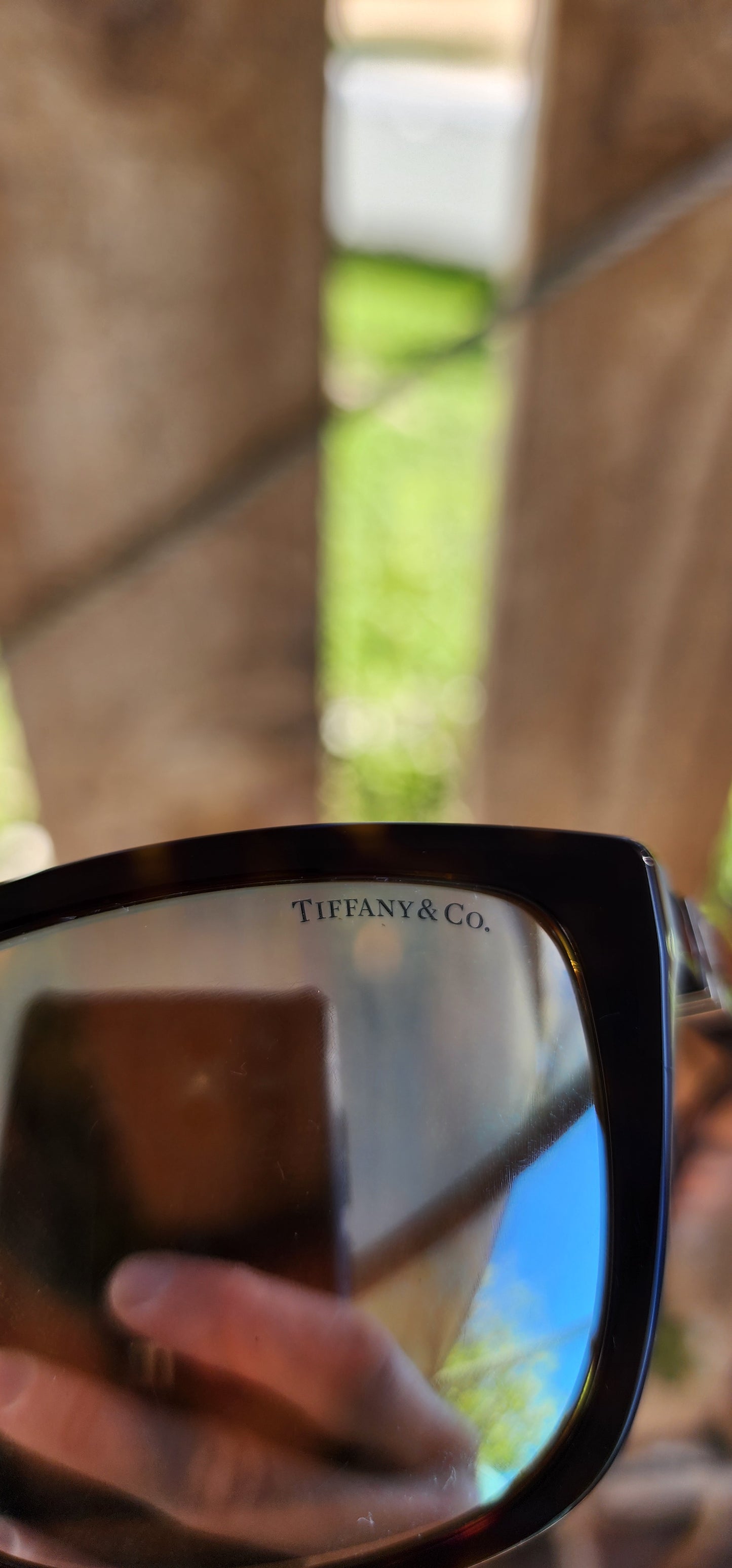 Authentic pair of unisex 40 Tiffany and Co Square Havana Blue and Faux Tortoise Shell frame Sunglasses with Brown mirror lenses.Model TF4124