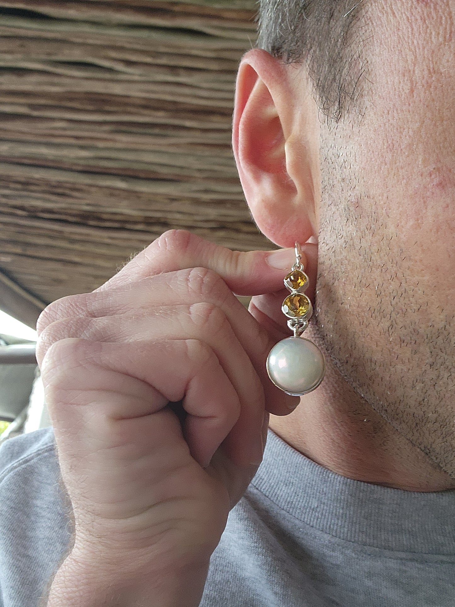 Gorgeous pair of Sterling Silver statement drop earrings. Featuring tube set Round Freshwater Button Pearl drops suspended from tube set Round and Cushion cut Citrine Gemstones.