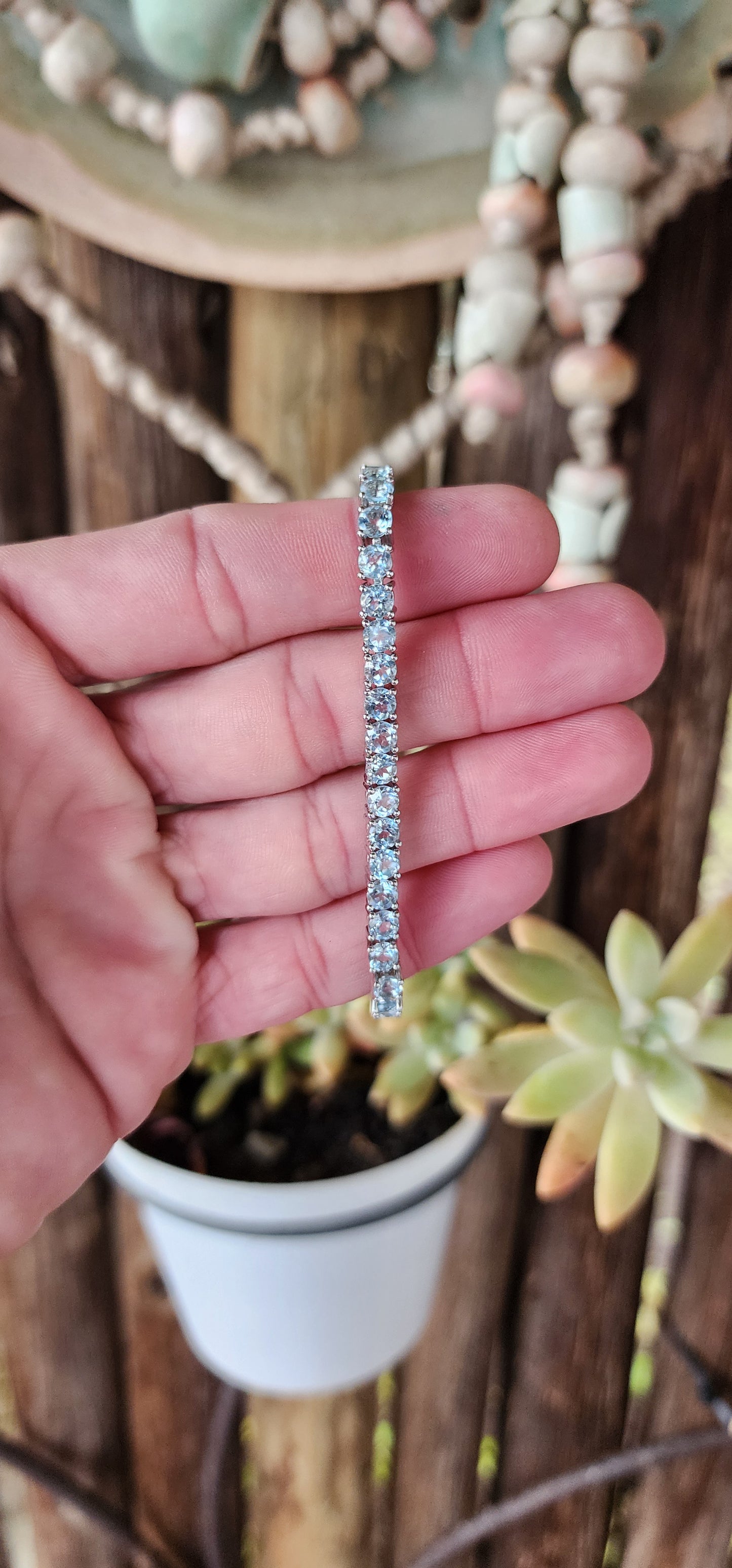 Sterling Silver and 37x Faceted Round cut Natural Sky Blue Topaz Gemstones Tennis bracelet.