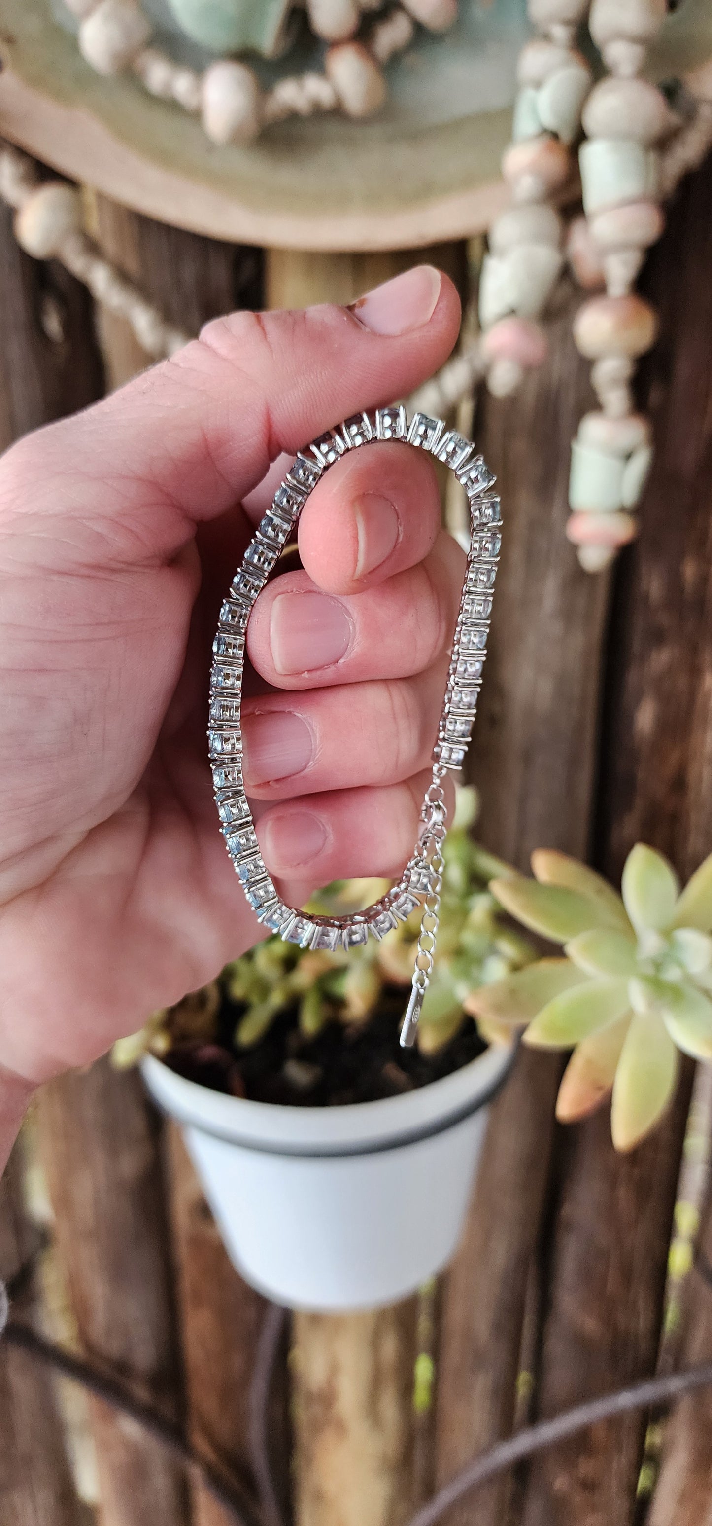 Sterling Silver and 37x Faceted Round cut Natural Sky Blue Topaz Gemstones Tennis bracelet.