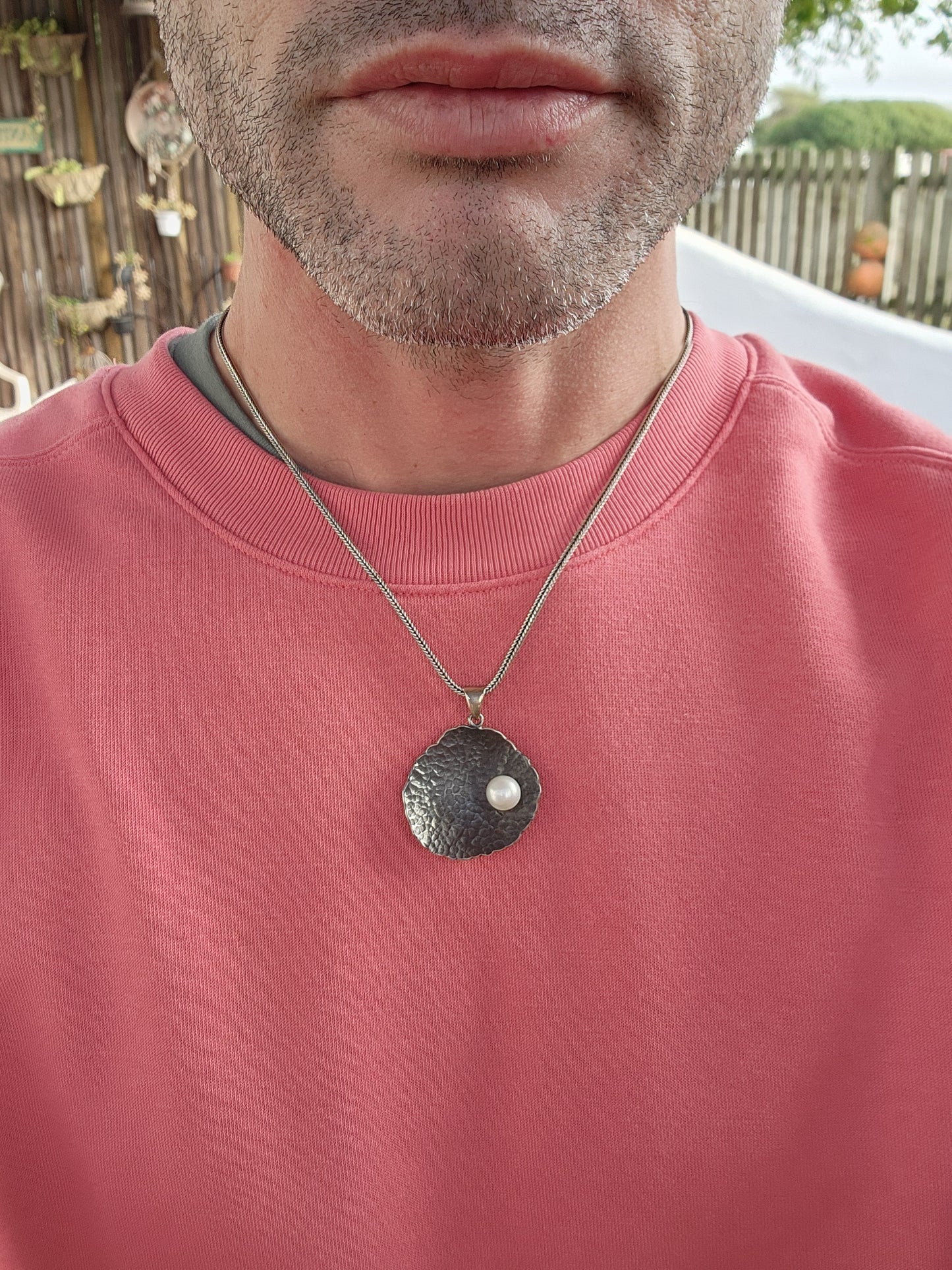 Unusual Artisan/Studio made Sterling Silver Modernist/Brutalist textured/hammered concave Round pendant with an Cultured Pearl , oxidised with an lovely Black patina.Fitted on an Sterling Silver Foxtail chain.