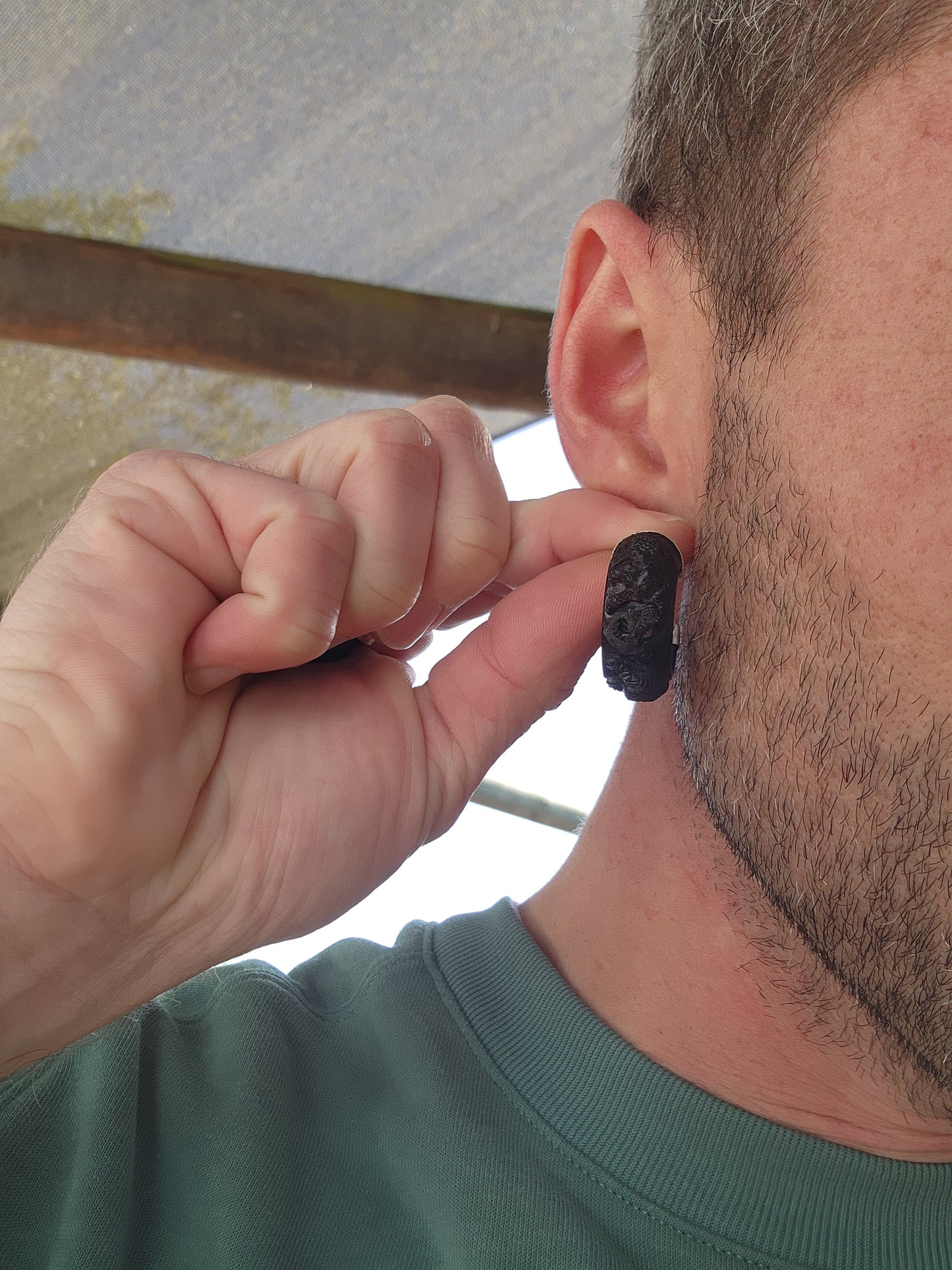 Vintage and chunky pair of Sterling Silver and Ebony wooden half hoop earrings.Each of the Black Ebony pieces ornately hand carved with majestic Elephant motifs.