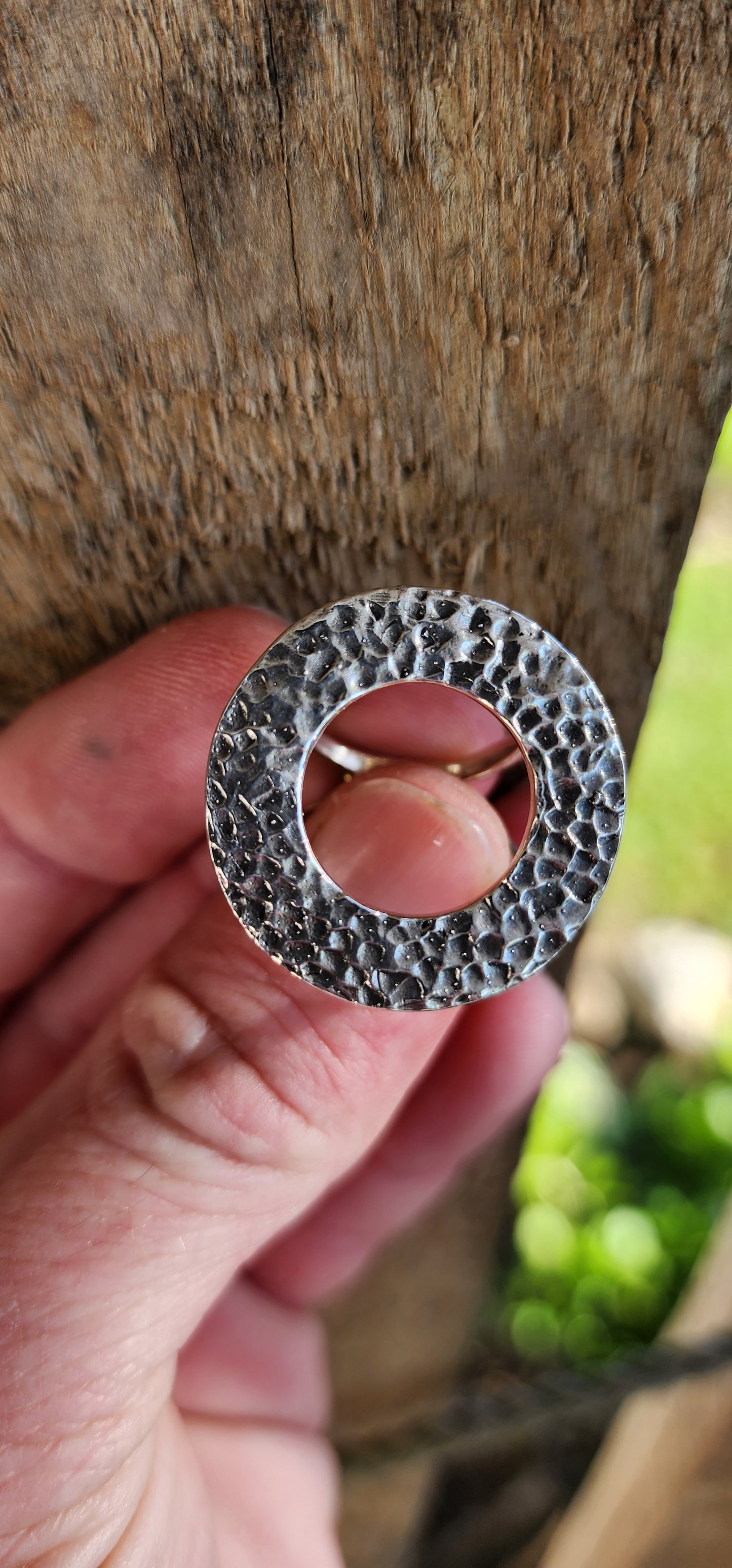 Unusual and chunky Artisan/Studio made Modernist in style Unisex Sterling Silver ring - An open/hammered Circle set on an double rounded tube split band.