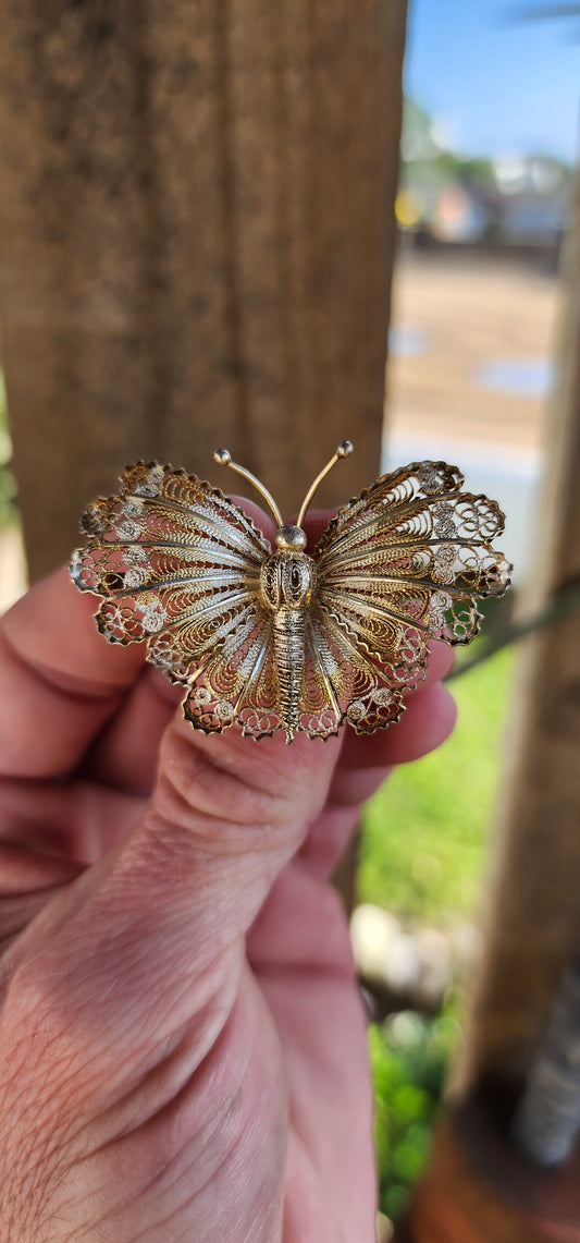 Vintage circa 1930's 800 Silver with Gold gilt Cannetille Filigree Butterfly brooch.
Wonderfully intricate, and large enough to make a bold statement.