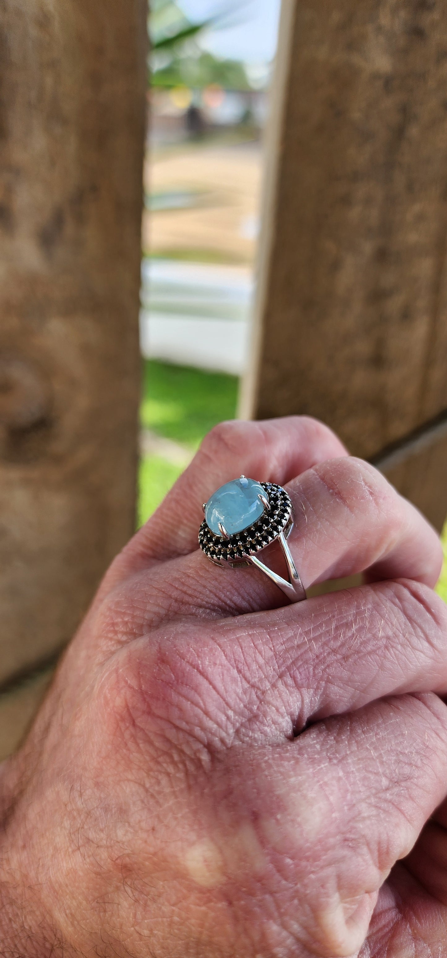 Sterling Silver, Aquamarine Cabochon and Black Spinel Gemstones dress ring.