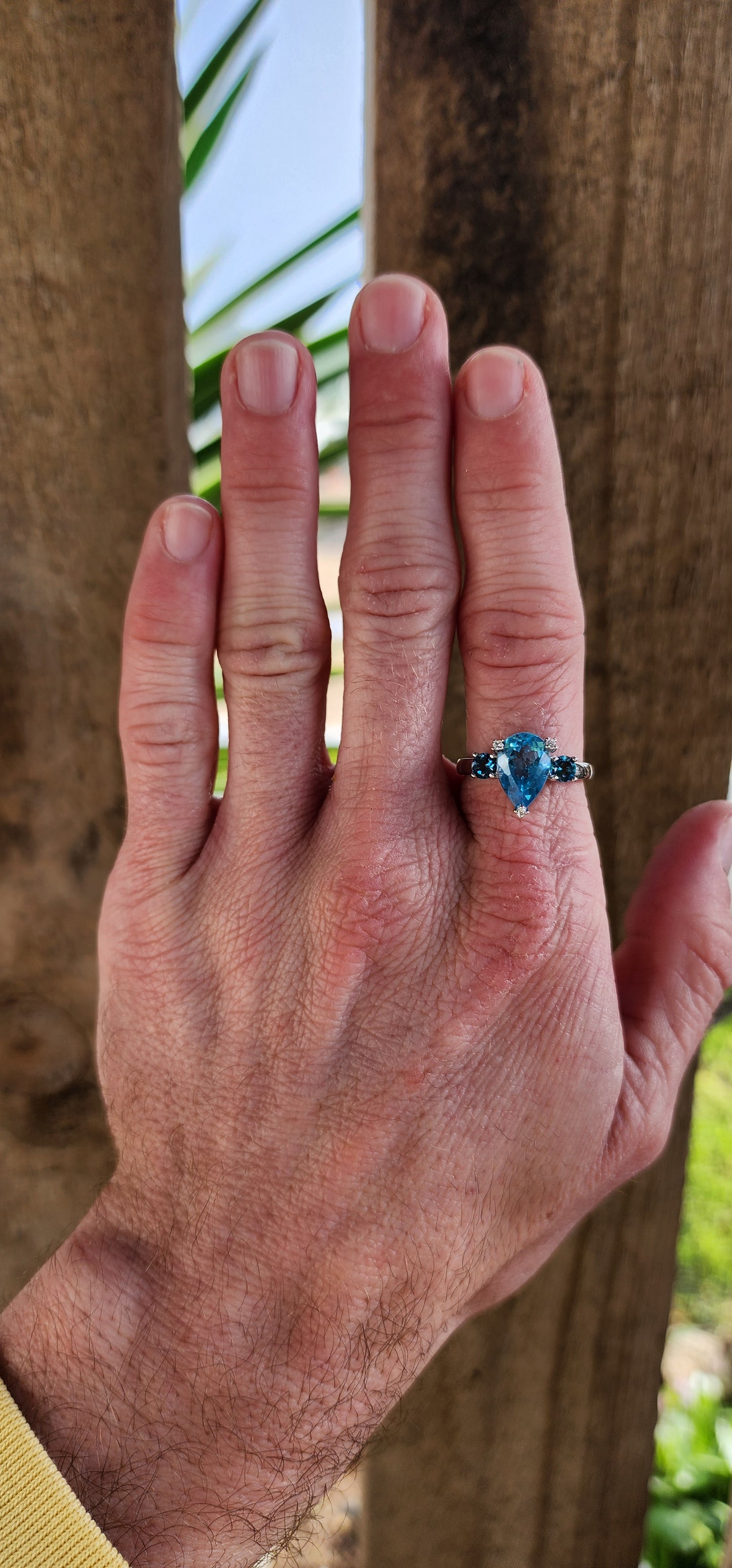 Matching set : Sterling Silver and Blue Topaz ring and pendant on chain.