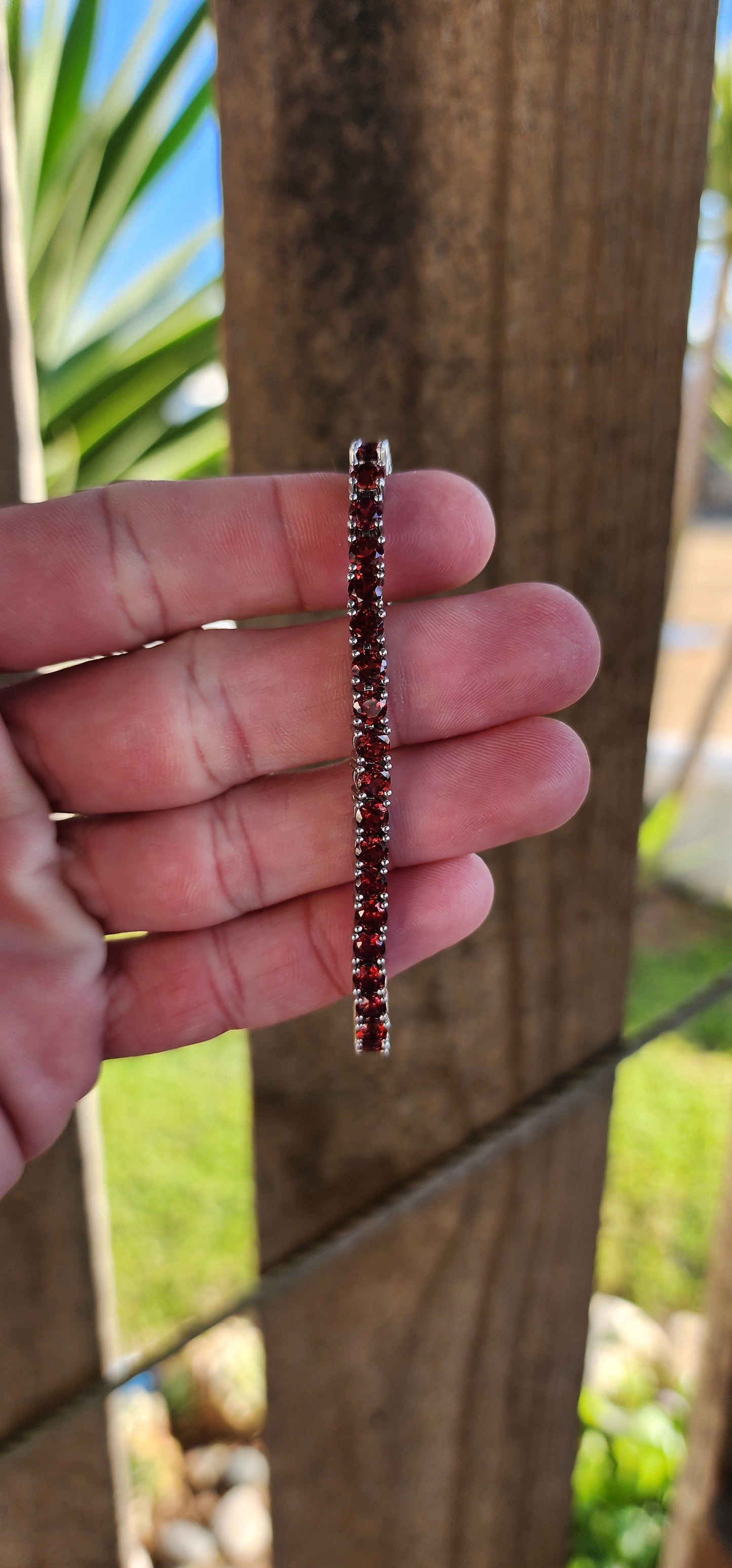 Sterling Silver and 37x Faceted Round cut Natural Garnet Gemstones Tennis bracelet.