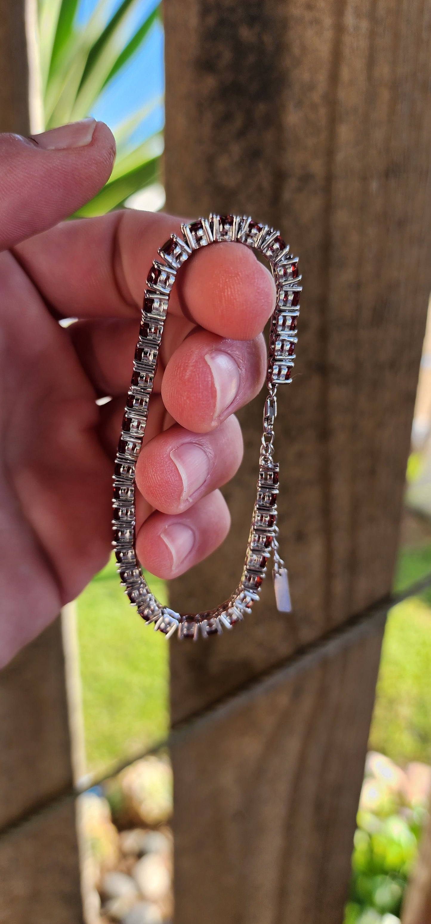 Sterling Silver and 37x Faceted Round cut Natural Garnet Gemstones Tennis bracelet.