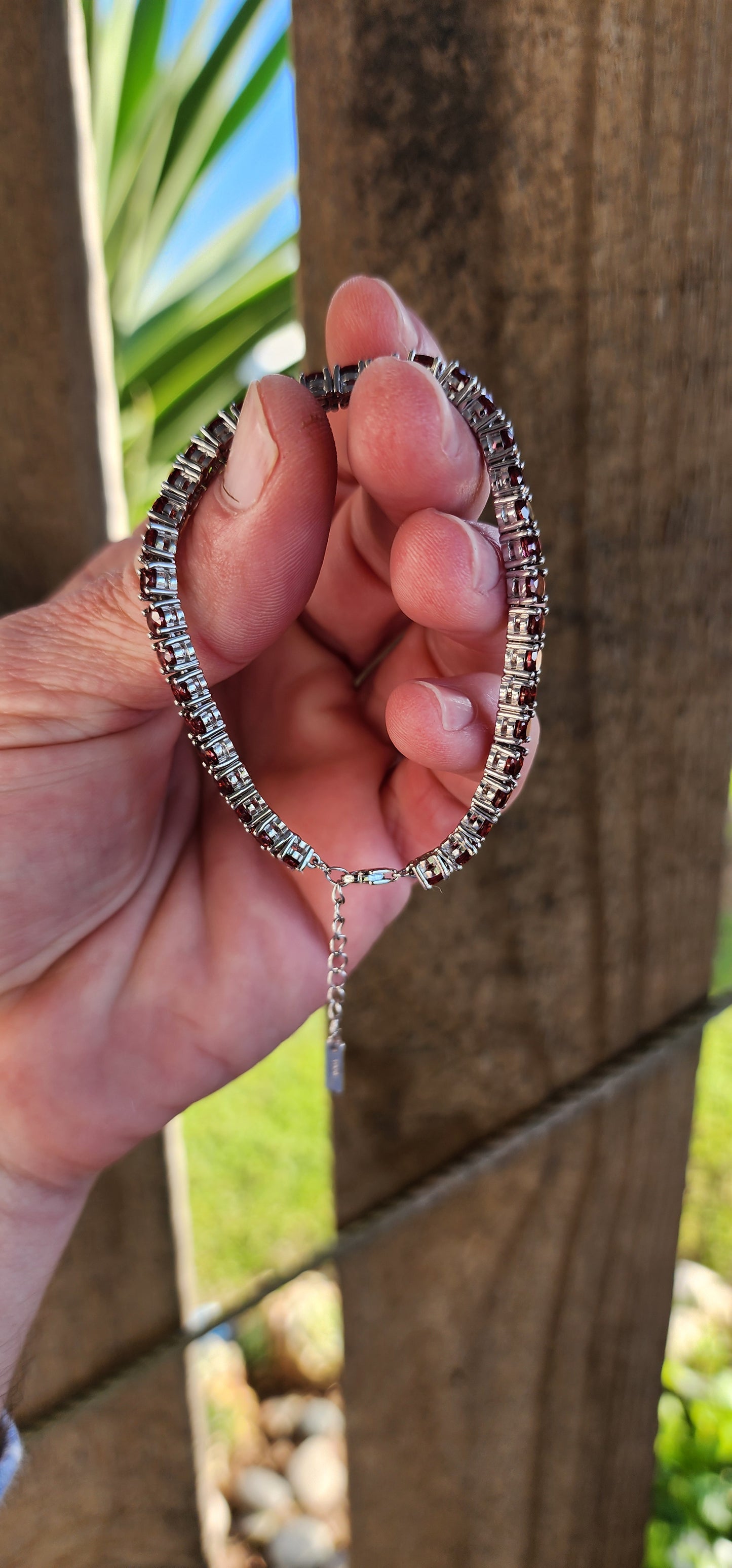 Sterling Silver and 37x Faceted Round cut Natural Garnet Gemstones Tennis bracelet.