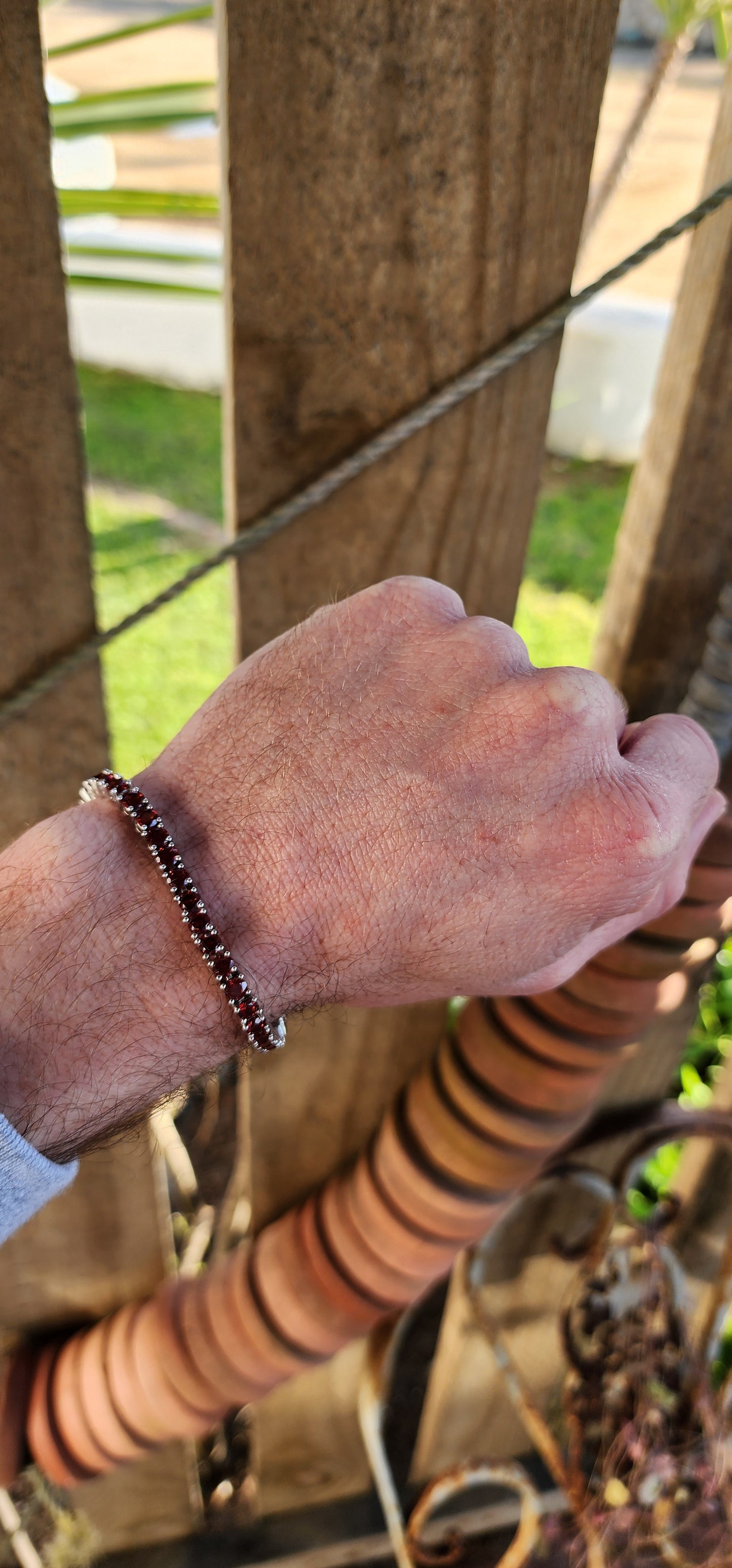 Sterling Silver and 37x Faceted Round cut Natural Garnet Gemstones Tennis bracelet.