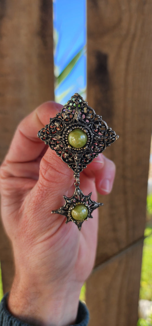 Large sized Vintage costume Scottish inspired dangle starburst brooch - set with faux Connemara Marble glass cabochons.