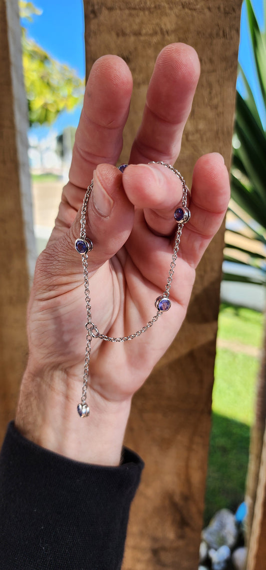 Gorgeous and elegant Sterling Silver and 5x Natural Round Cut Tanzanite Gemstones Station bracelet - The lovely Tanzanite Gems have been bezel/tube set.The bracelet is Adjustable.