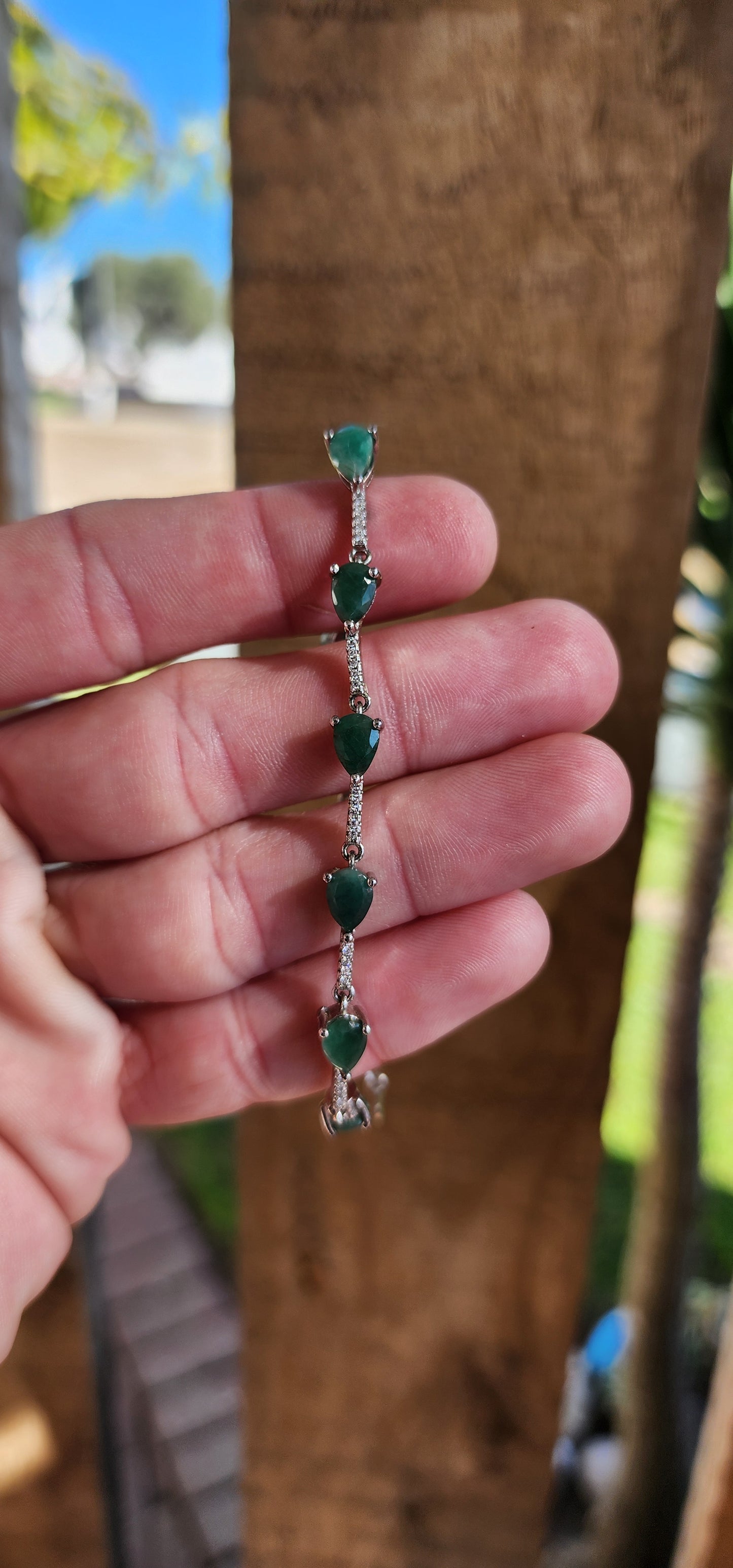 Exotic Natural Emeralds and Sterling Silver adjustable Tennis style bracelet.