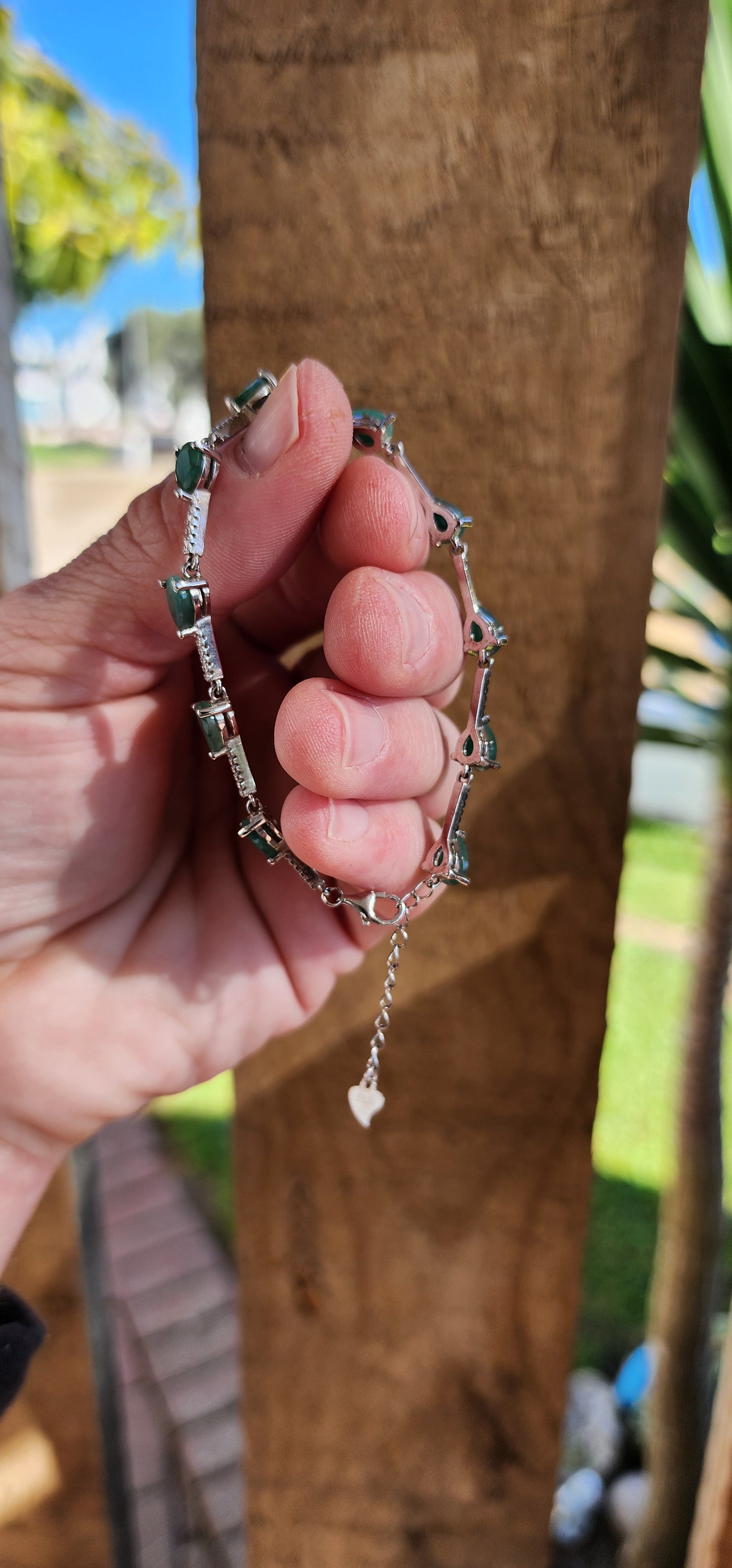 Exotic Natural Emeralds and Sterling Silver adjustable Tennis style bracelet.