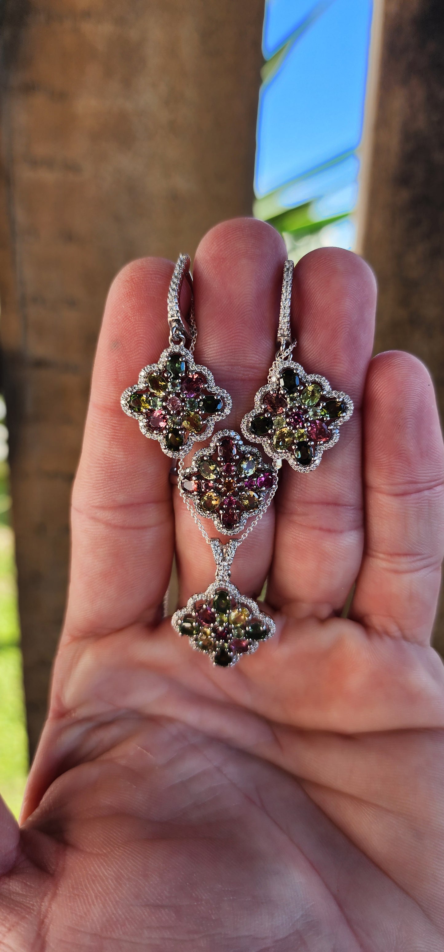 Marvelous Sterling Silver and multicolor Tourmaline Gemstones matching set consisting out of Ring , earrings and pendant on chain.