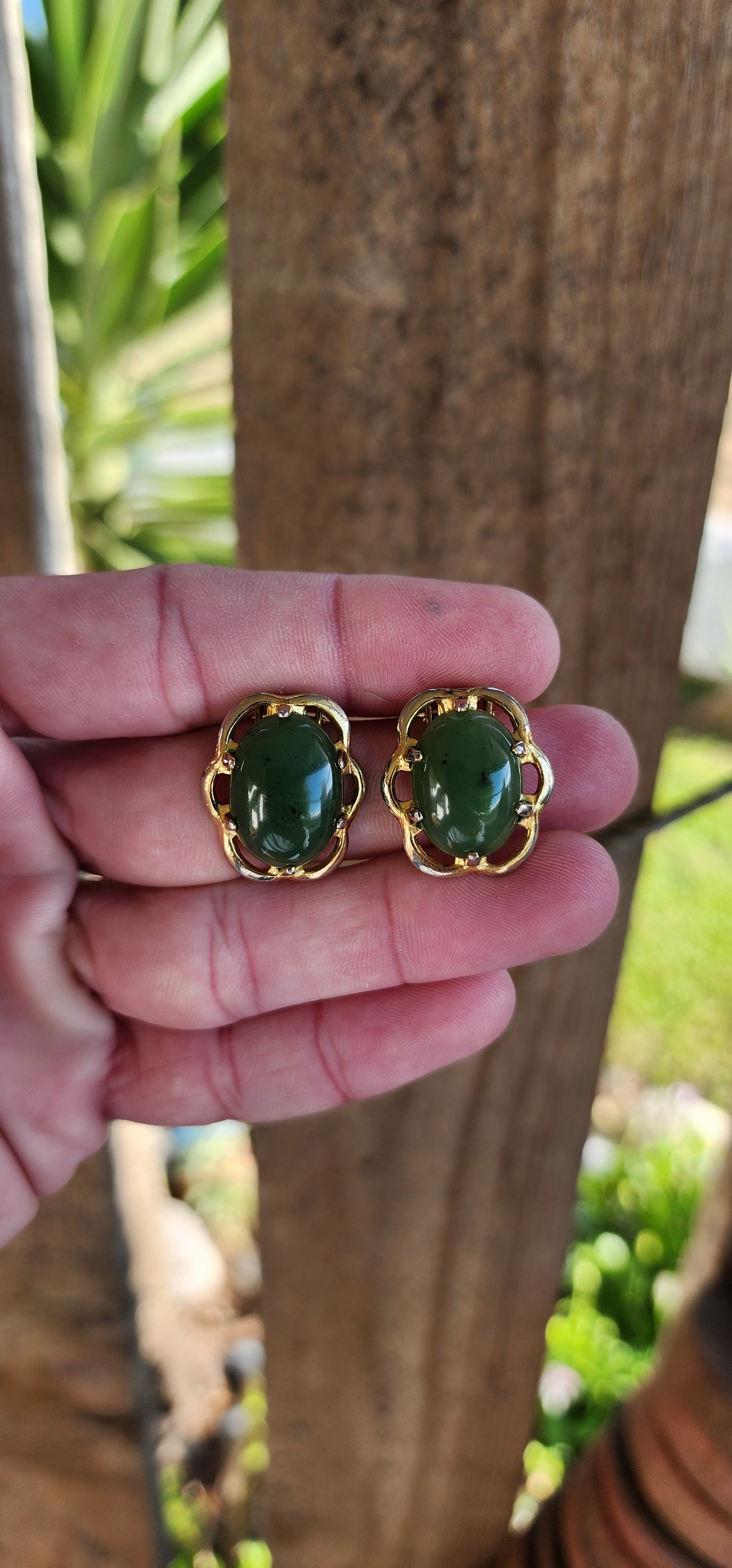 Beautiful pair of Vintage Designer clip-on earrings.Yellow Gold filled and prong set with lovely Green Nephrite Jade " Spinach Jade" Cabochons.