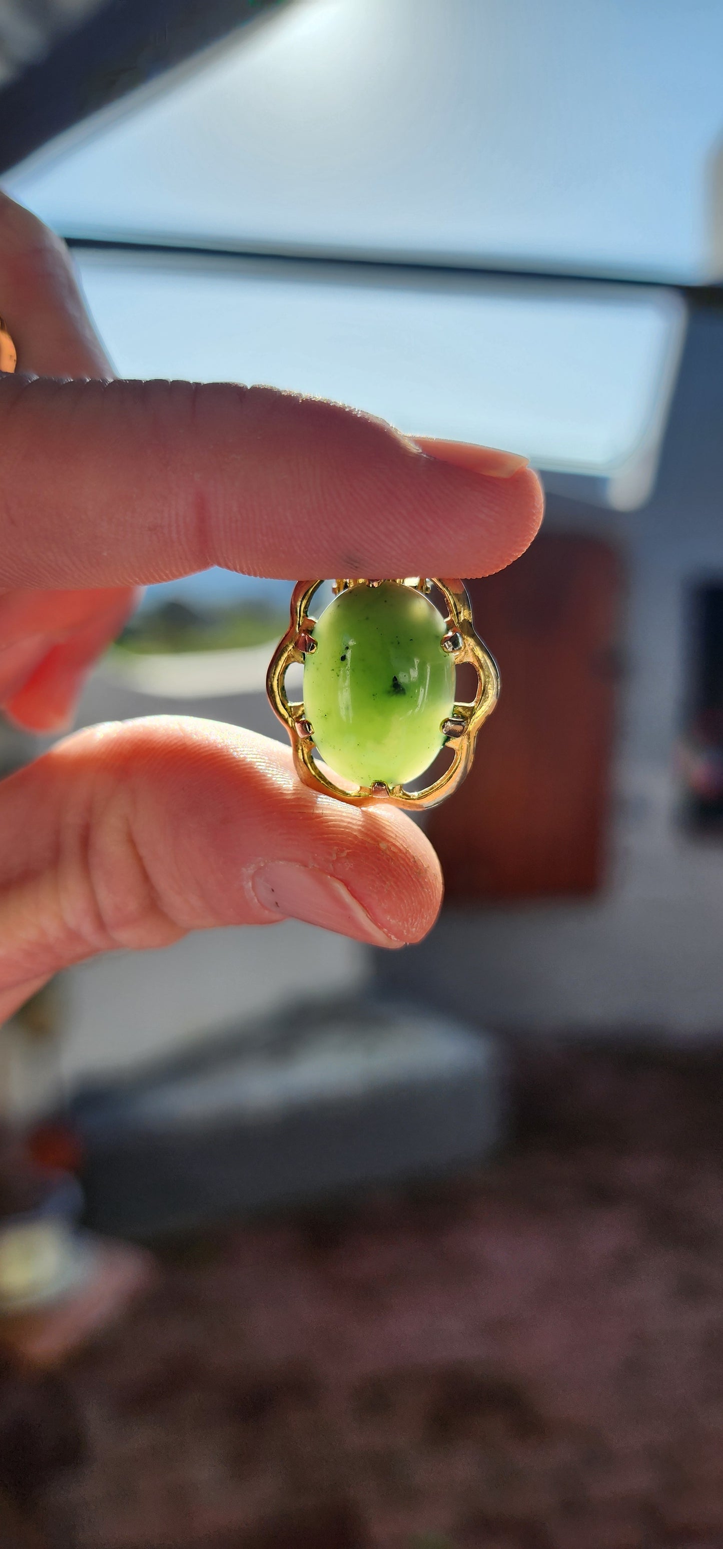 Beautiful pair of Vintage Designer clip-on earrings.Yellow Gold filled and prong set with lovely Green Nephrite Jade " Spinach Jade" Cabochons.