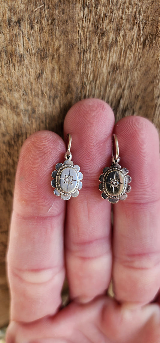 Elegant and feminine pair of Victorian 9ct White Gold and Diamonds North Star earrings,fitted with Shepherds hooks and safety clips.