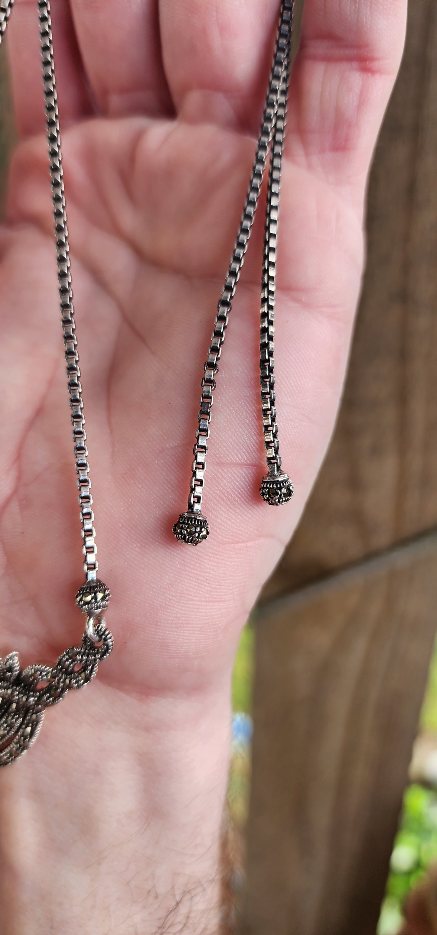 Elegant Sterling Silver and sparkly Marcasite Gemstones Art Deco style box chain necklace with pendant - The pendant adorned with multiple sparkly Marcasites and milgrain detailing.