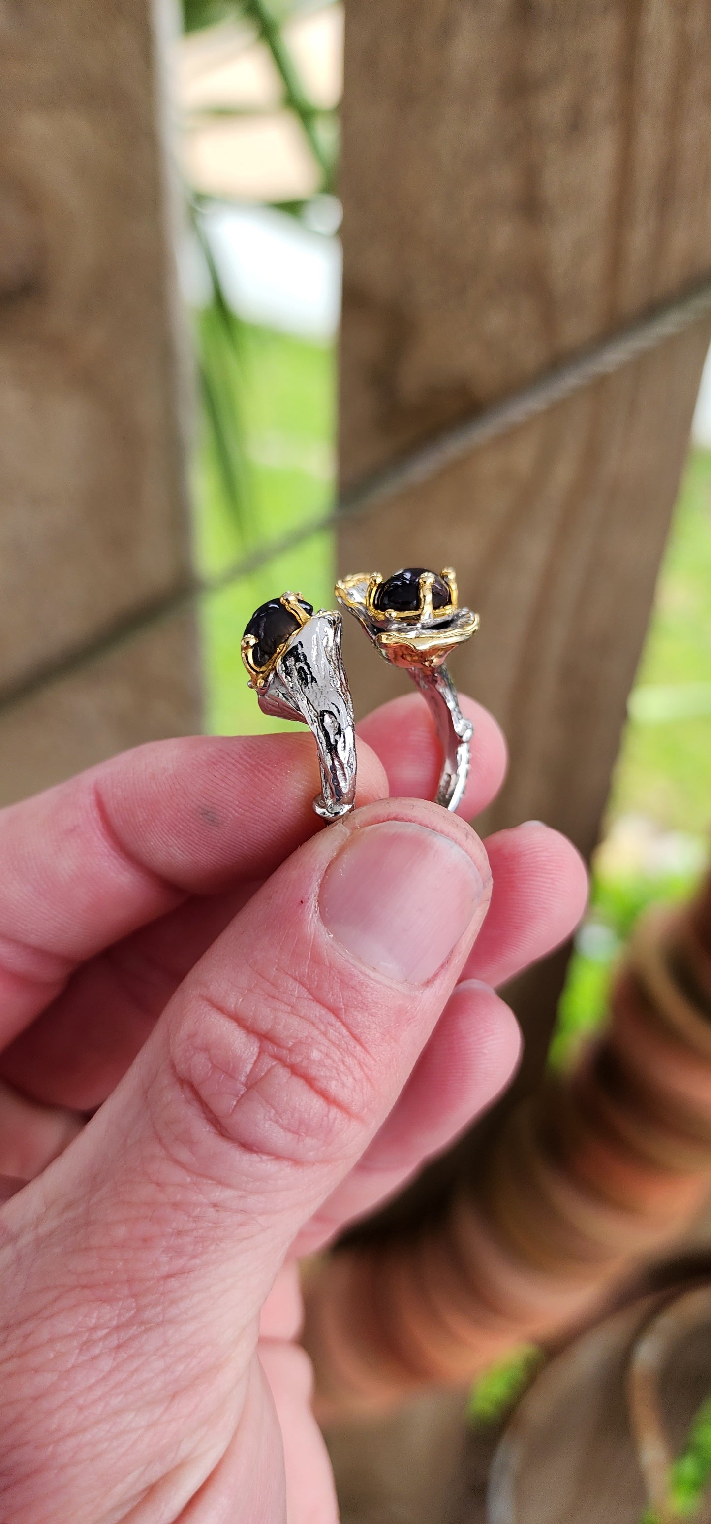 Beautiful and unusual Artisan made Sterling Silver with 18ct Yellow Gold plated accents unisex ring - Prong set with two lovely Oval cut Iolite Cabochons in flower like baskets , the shank with a tree branch motif.