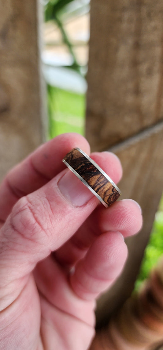 Custom Artisan made Mens Sterling Silver and Zebrawood inlay wedding band.