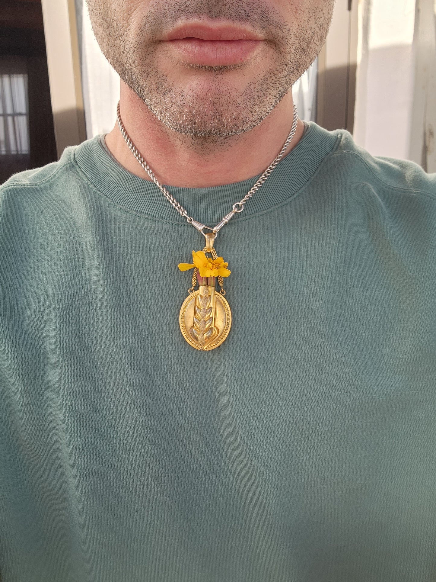 Antique Victorian Oval shaped Gold gilt over Brass Posy holder pendant suspended from two chains attached to the bail- The first Posy pendant ive ever come across. The front ornately decorated with a embossed Wheat grain.