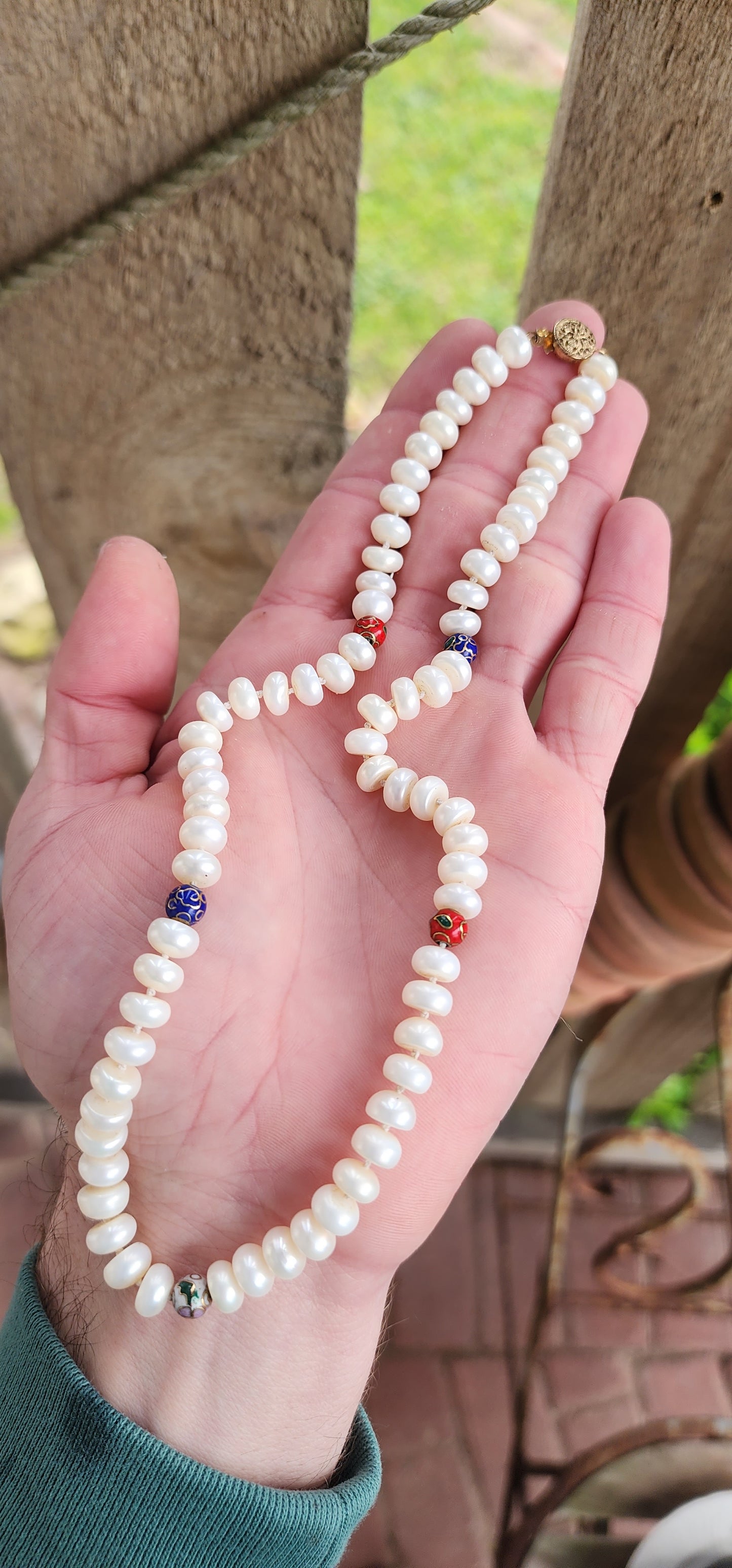 Vintage and Classical necklace featuring Freshwater Button Pearls with added Cloisonne spacer beads .