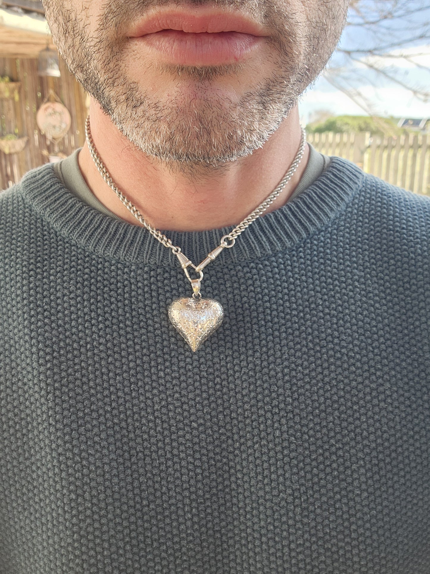 Chunky Vintage Sterling Silver, two-sided, repousse puffy Heart pendant featuring clusters of embossed Stars on both sides.