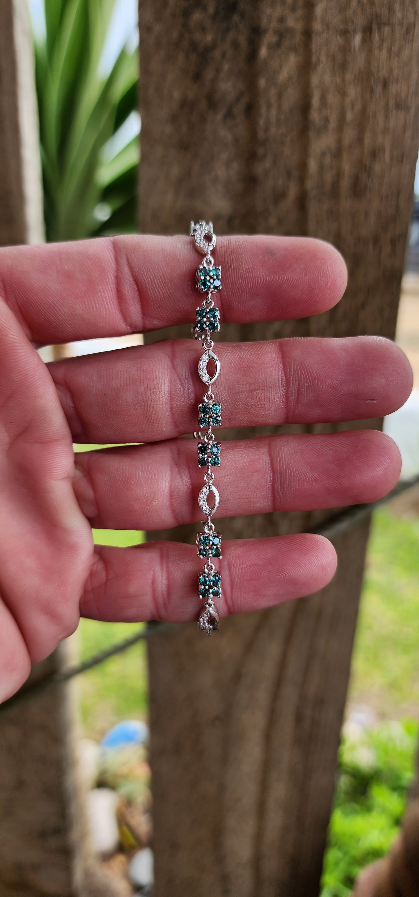 Elegant Sterling Silver , Green Topaz and CZ Gemstones Tennis bracelet - Fitted with a push-in box clasp and safety latch.