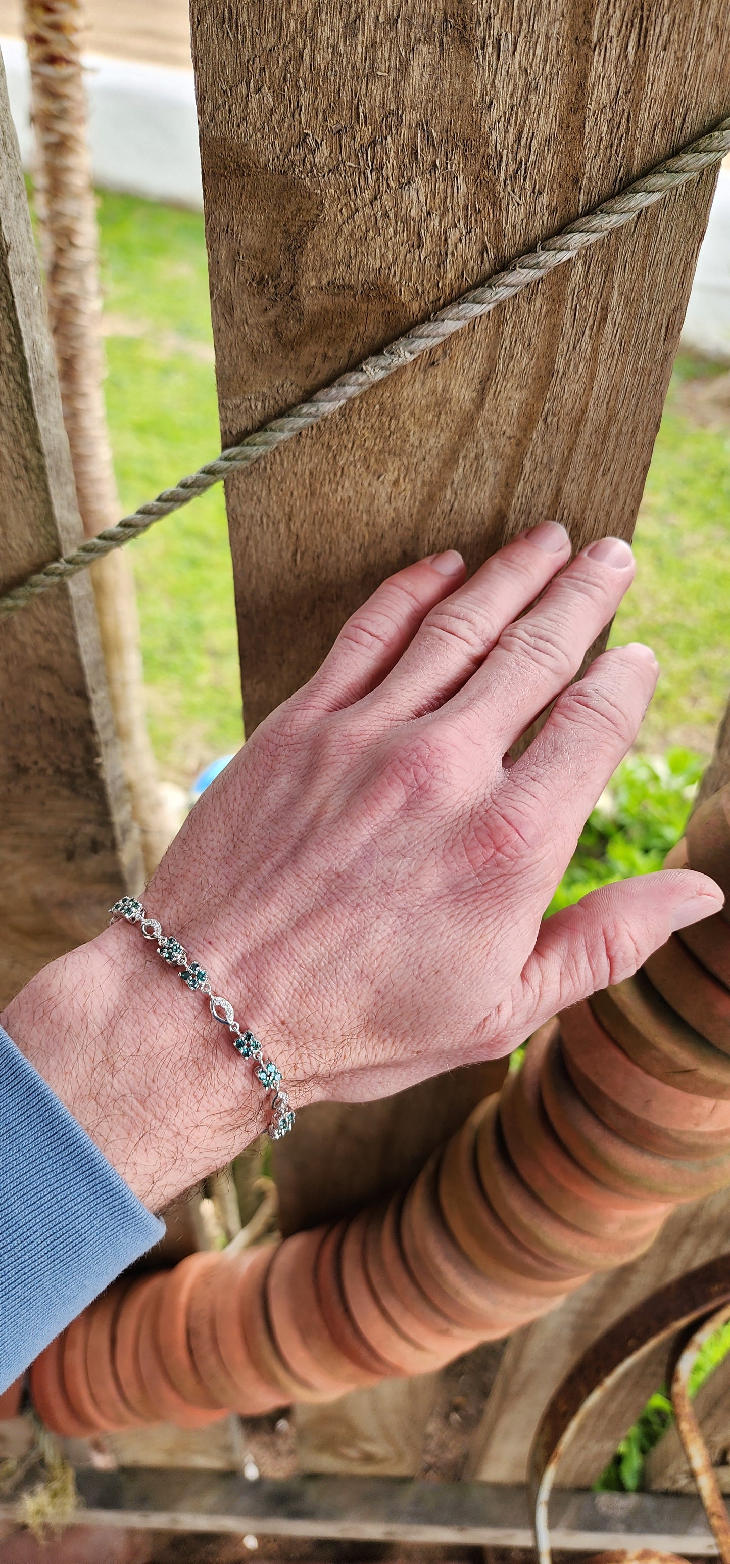 Elegant Sterling Silver , Green Topaz and CZ Gemstones Tennis bracelet - Fitted with a push-in box clasp and safety latch.