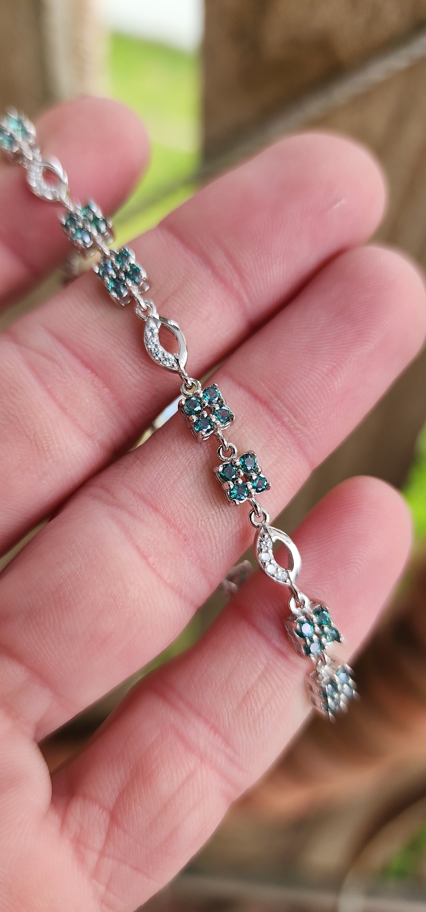 Elegant Sterling Silver , Green Topaz and CZ Gemstones Tennis bracelet - Fitted with a push-in box clasp and safety latch.