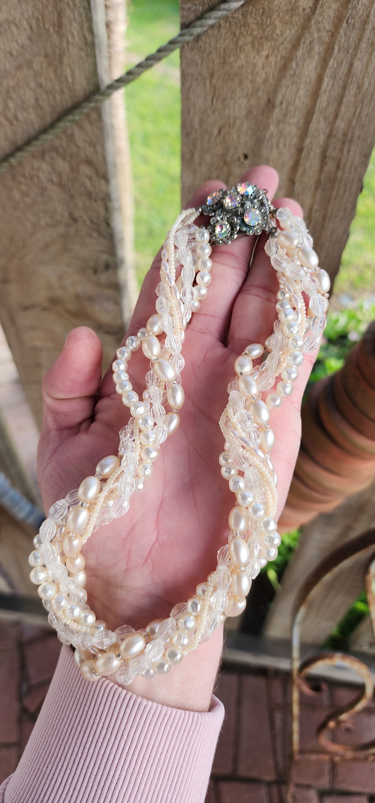 Vintage beauty ! A lovely Vintage 80's 7x strand costume beaded necklace , the beads include faux Pearls , Seed beads and clear Resin beads.