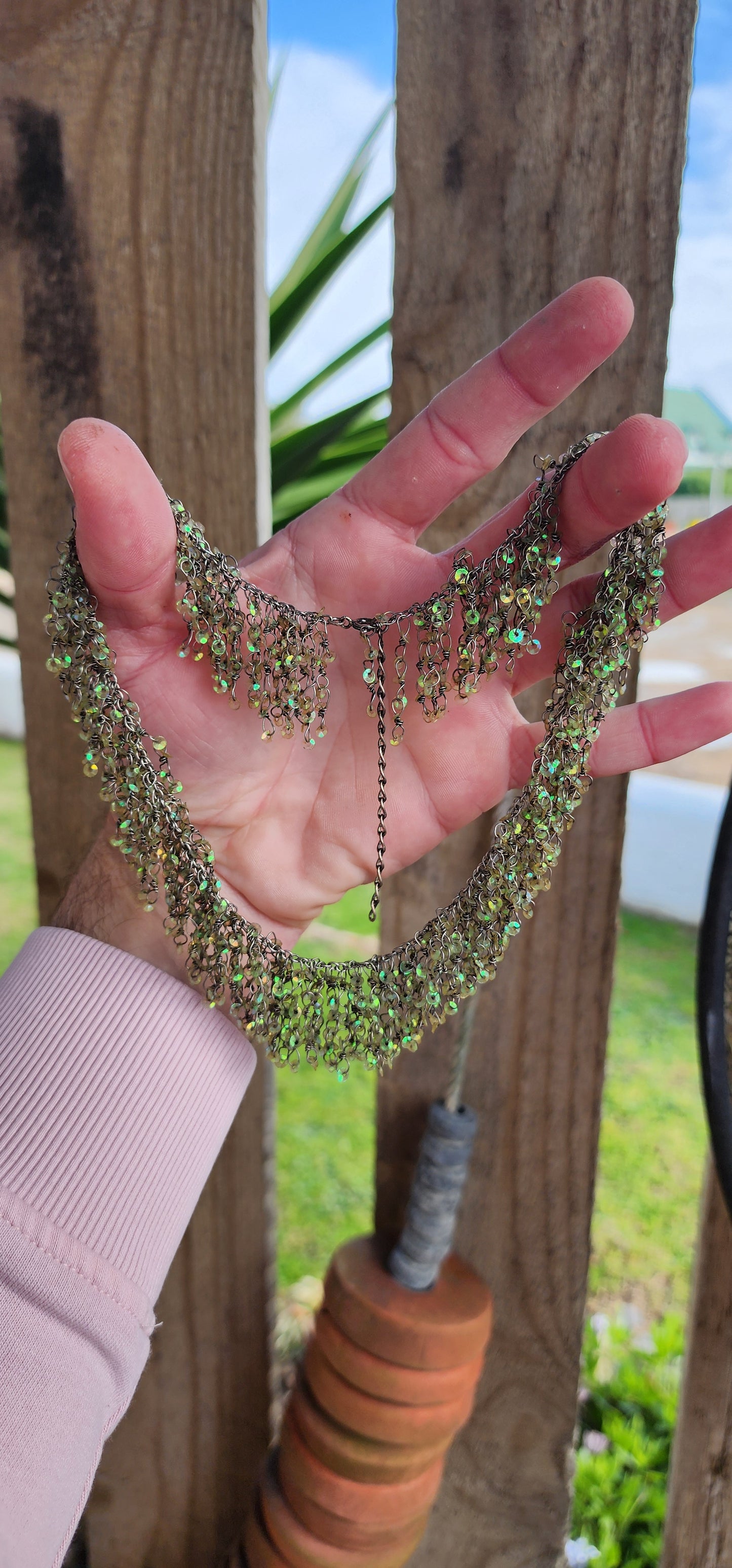 Artisan made waterfall necklace , the waterfall drops are hand-wrapped Sterling Silver wire with sparkly Green Sequince accents , the Sequince sparkle beautifully,esp in the Sun.