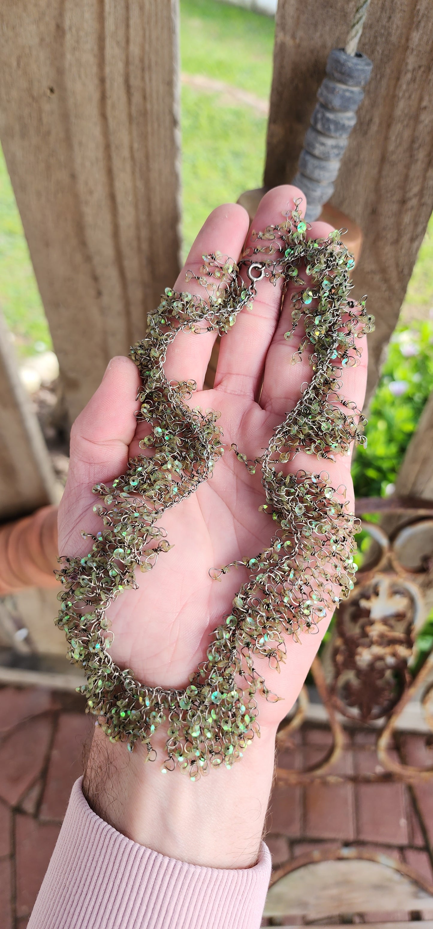 Artisan made waterfall necklace , the waterfall drops are hand-wrapped Sterling Silver wire with sparkly Green Sequince accents , the Sequince sparkle beautifully,esp in the Sun.