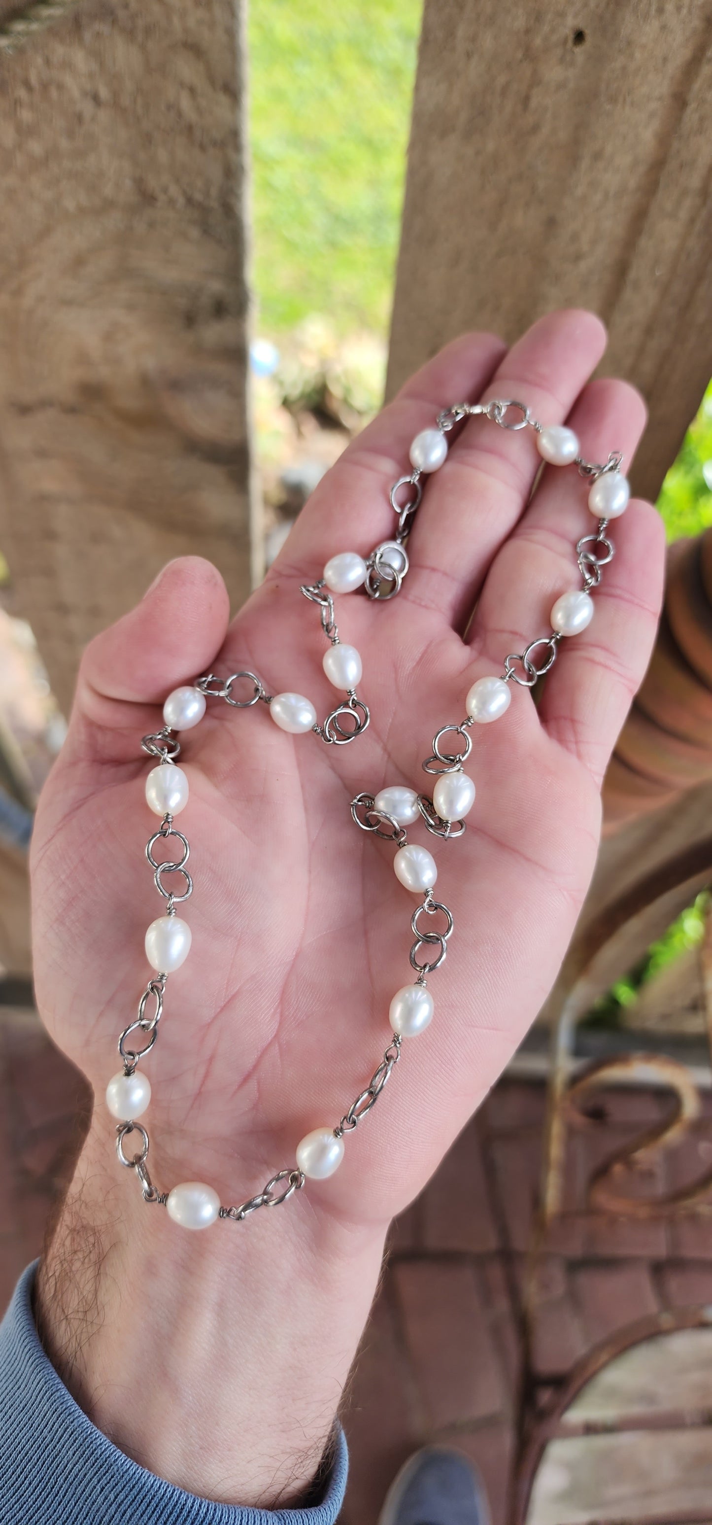 Beautiful Artisan/studio made Sterling Silver and Oval shaped Freshwater Pearls Quatrefoil style chain necklace , each Pearl bead hand wrapped with Sterling Silver wire.