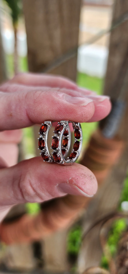 Gorgeous pair of Sterling Silver and Almandine Garnet Gemstones Huggies/Hoop earrings .Each earring set with 6x Oval Faceted Cut Garnets.