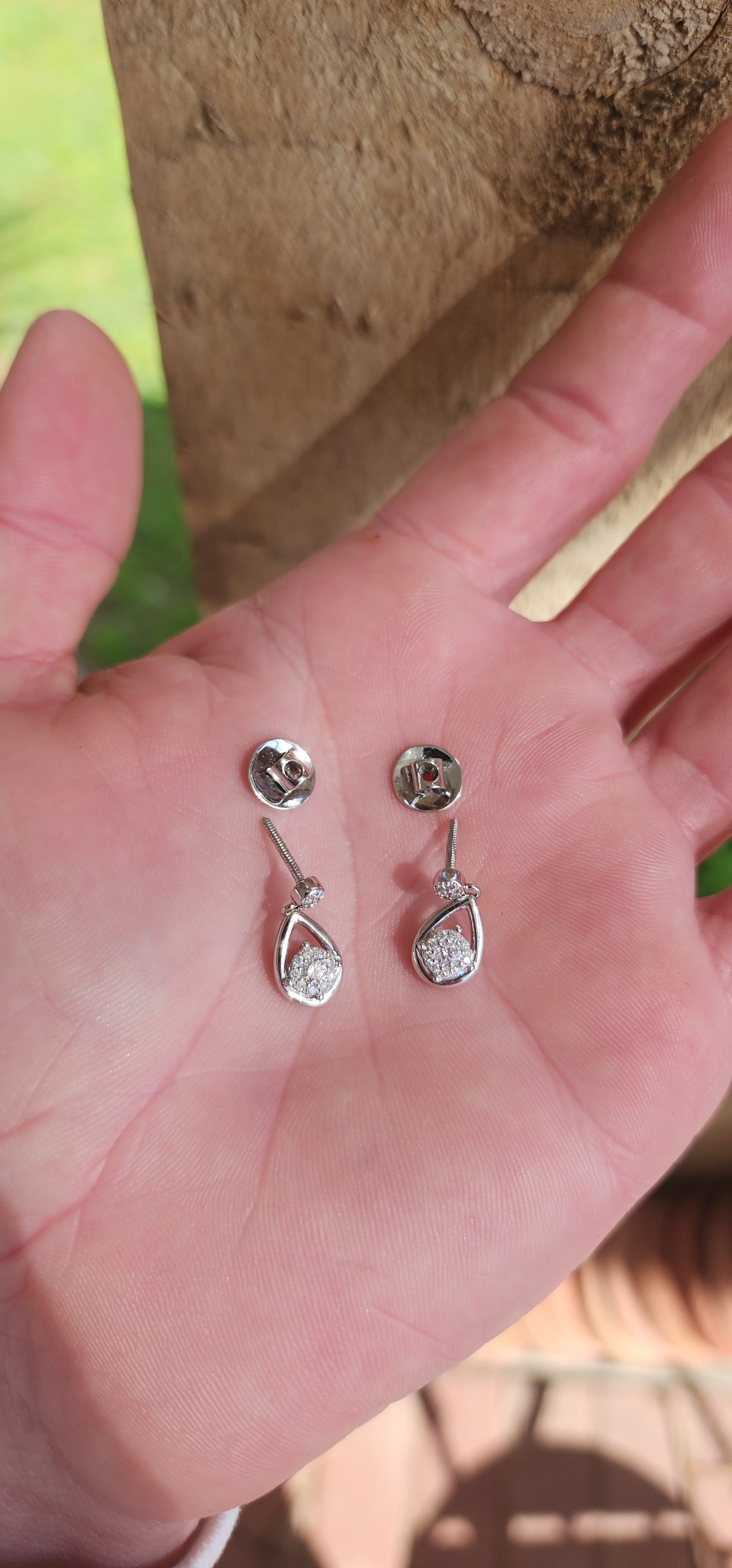 Easy and elegant, these Diamond drop earrings are perfect for that special evening out. Crafted in polished 10ct White Gold, each pear-shaped frame houses a Round cluster of shimmering Diamonds at its centre.