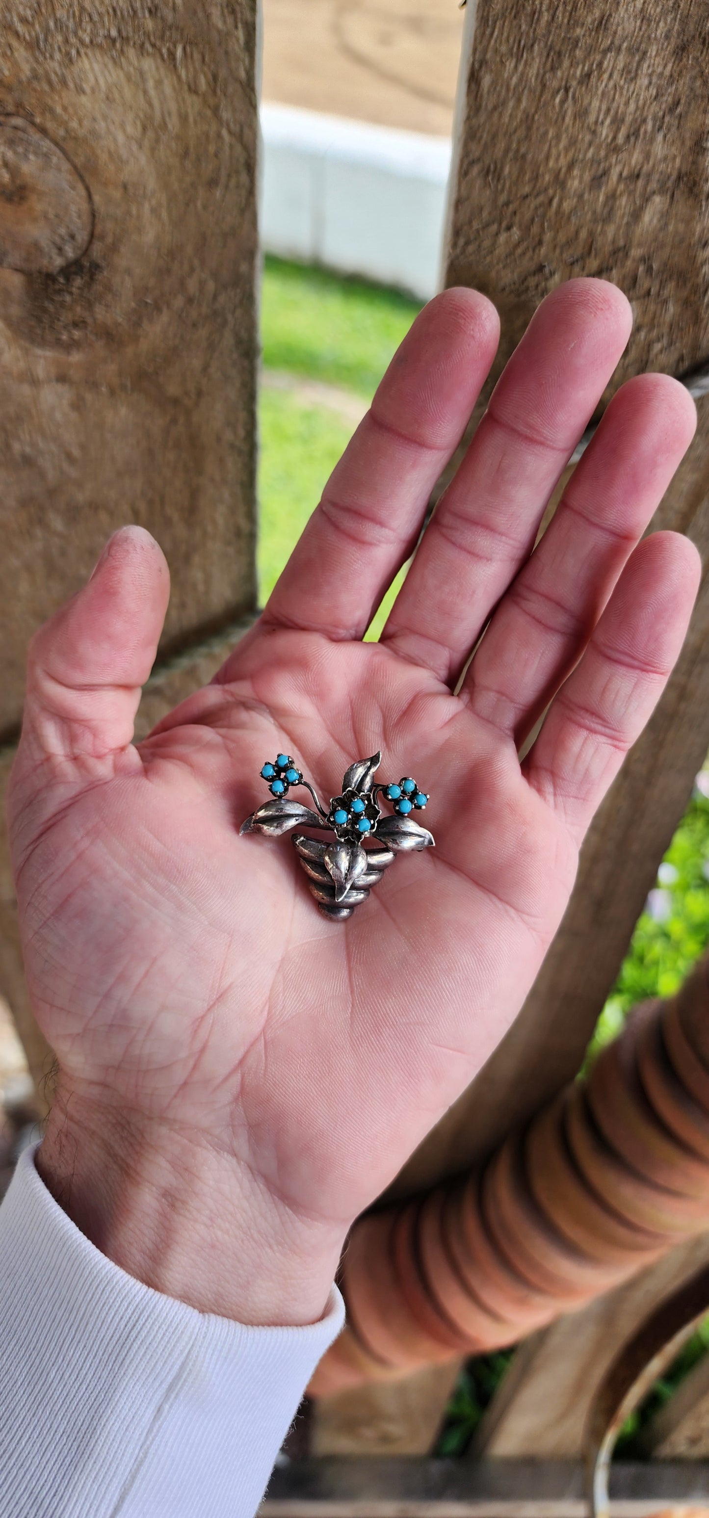 Vintage 800 Silver and Turquoise Cabochons pot plant brooch with flowers and leaves , the flowers each studded with small Turquoise Cabochons in prong settings.