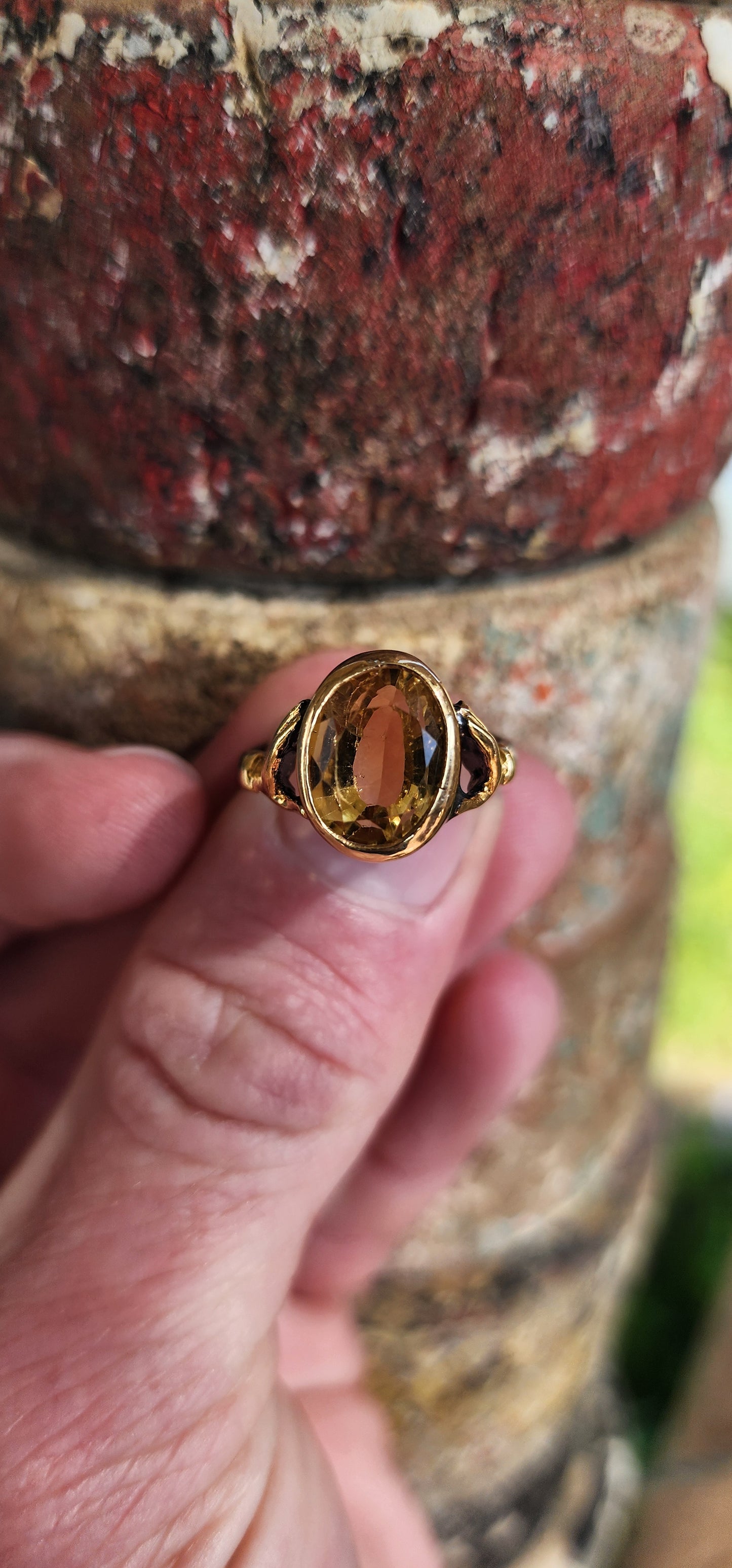 How stunning is this modern Sterling Silver Claddagh style ring ?! The centre bezel/tube set with a generous in size Oval cut Citrine Gemstone, the bezel being Sterling Silver with 18ct Yellow Gold plating.