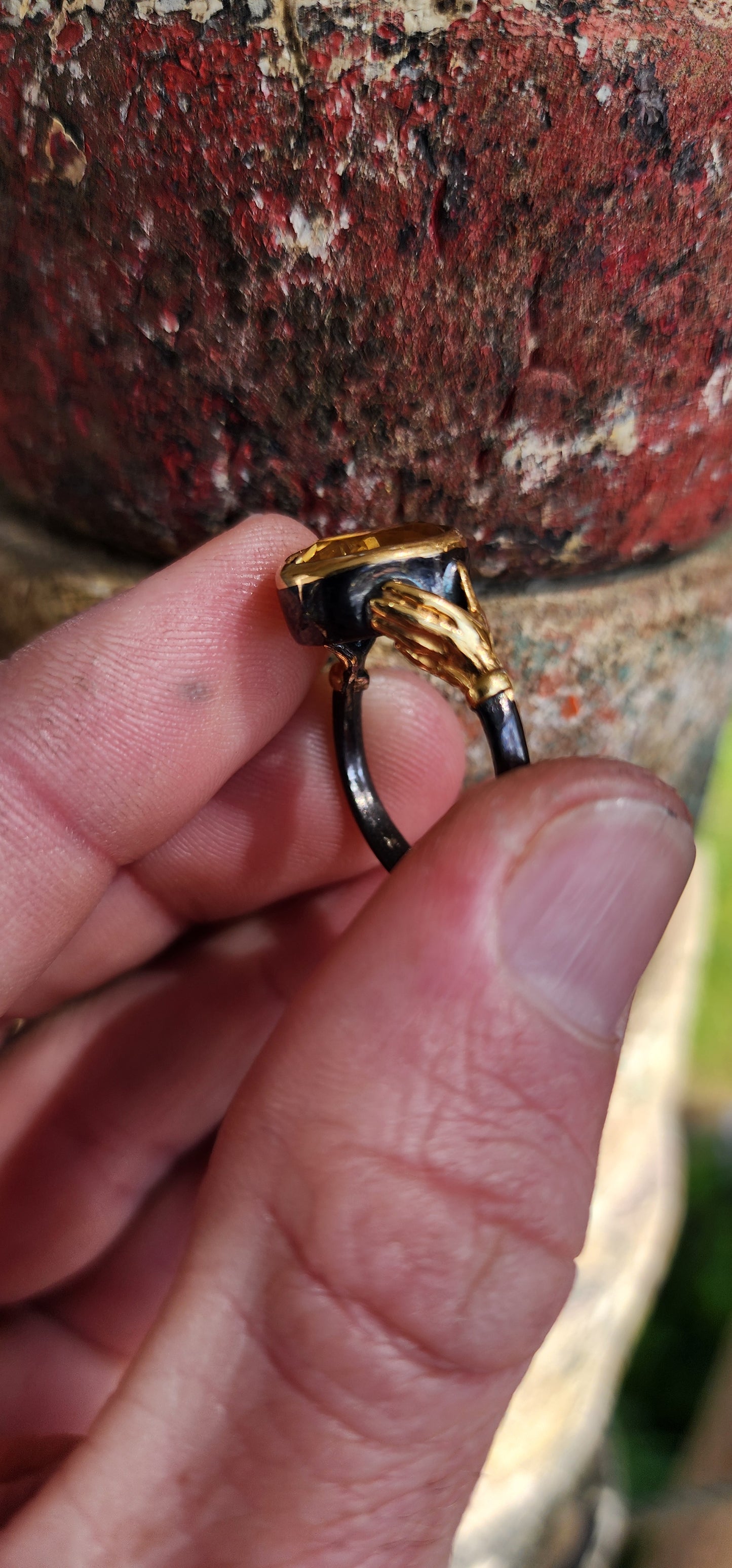 How stunning is this modern Sterling Silver Claddagh style ring ?! The centre bezel/tube set with a generous in size Oval cut Citrine Gemstone, the bezel being Sterling Silver with 18ct Yellow Gold plating.