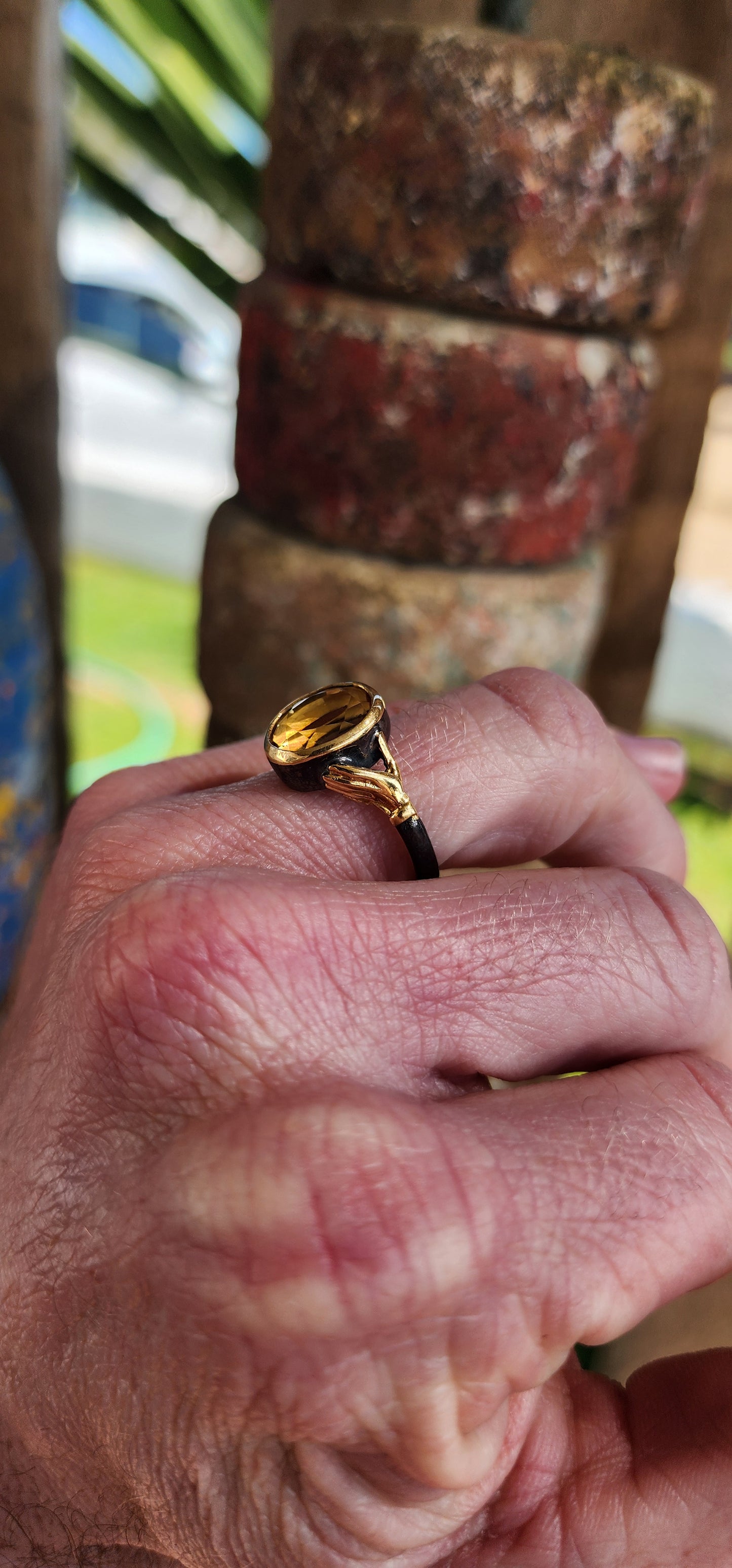 How stunning is this modern Sterling Silver Claddagh style ring ?! The centre bezel/tube set with a generous in size Oval cut Citrine Gemstone, the bezel being Sterling Silver with 18ct Yellow Gold plating.