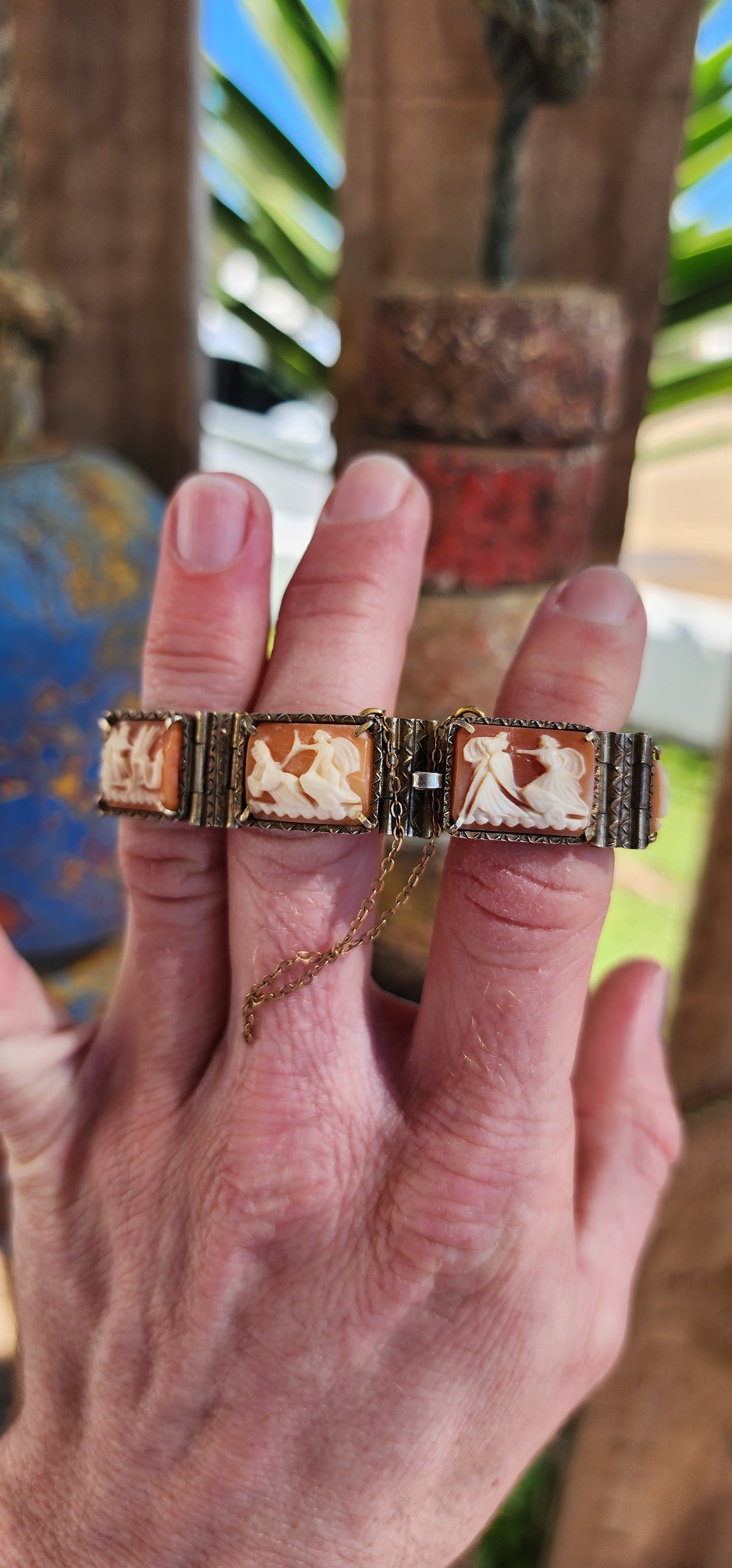 An extraordinary and rare Antique Victorian  Italian Sardonyx Cameo Mythology 7-panel bracelet. Hand-carved and in a lovely 800 silver setting, this bracelet features stunning scenes of Roman gods racing chariots representing the days of the week.