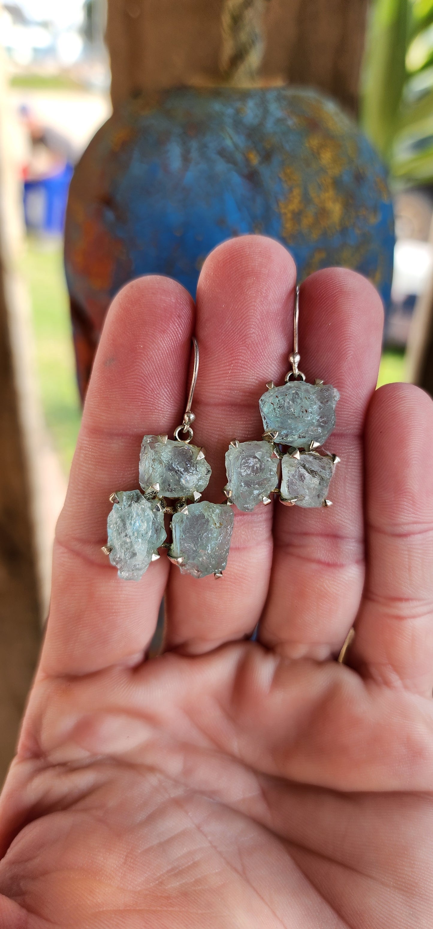 One of a kind beauties! These fabulous and unusual Sterling Silver dangle earrings are prong set with clusters of raw/rough Aquamarine specimens .