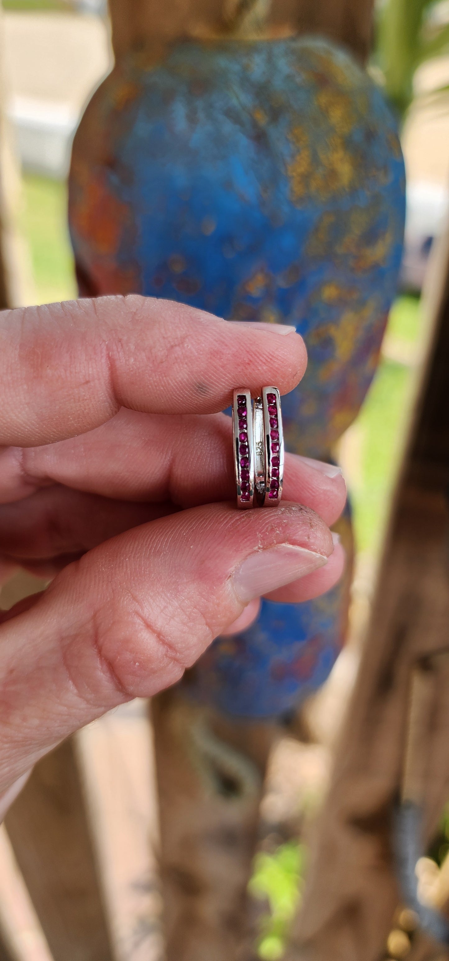 Minimalistic beauties!These Channel set Rubies and Sterling Silver Oval shaped Huggies are the perfect piece to add an edge to your everyday outfit.They are designed to hug your ear and are comfortable enough for everyday wear.