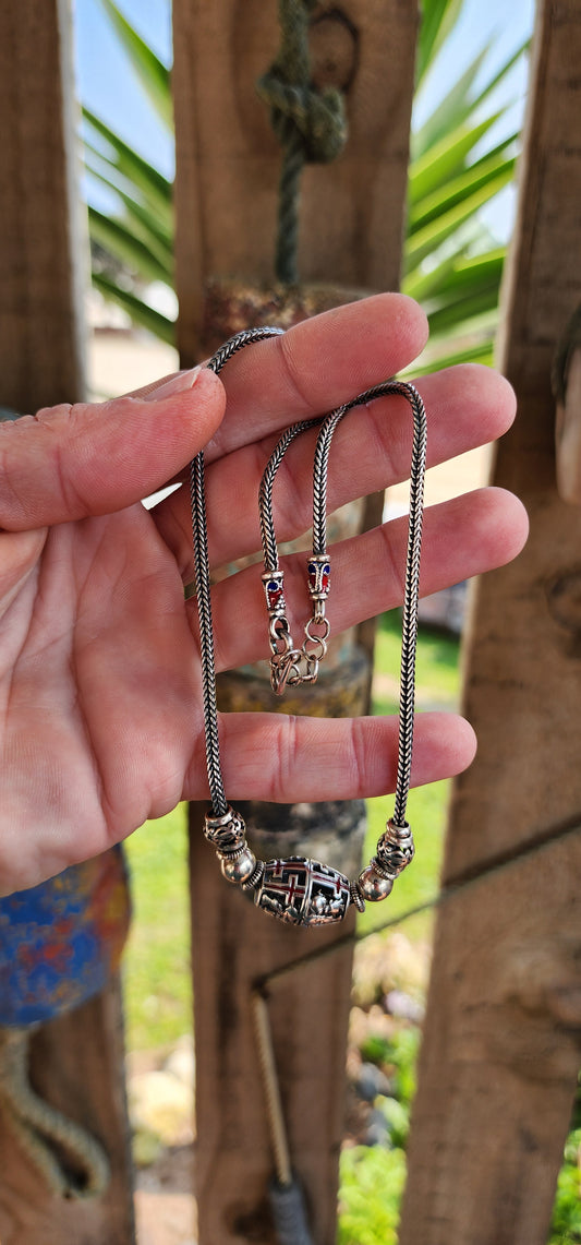 This alluring Sterling Silver Fox tail necklace features a collection of decorative Sterling Silver beads and spacers with pierced openwork and Enamelling.