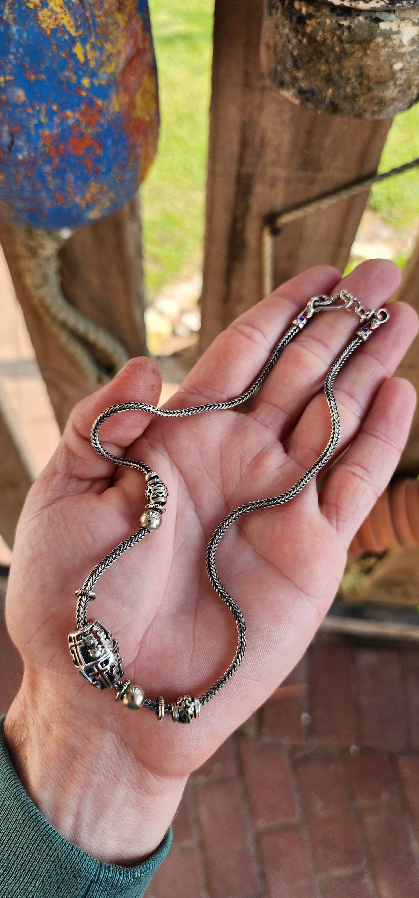 This alluring Sterling Silver Fox tail necklace features a collection of decorative Sterling Silver beads and spacers with pierced openwork and Enamelling.