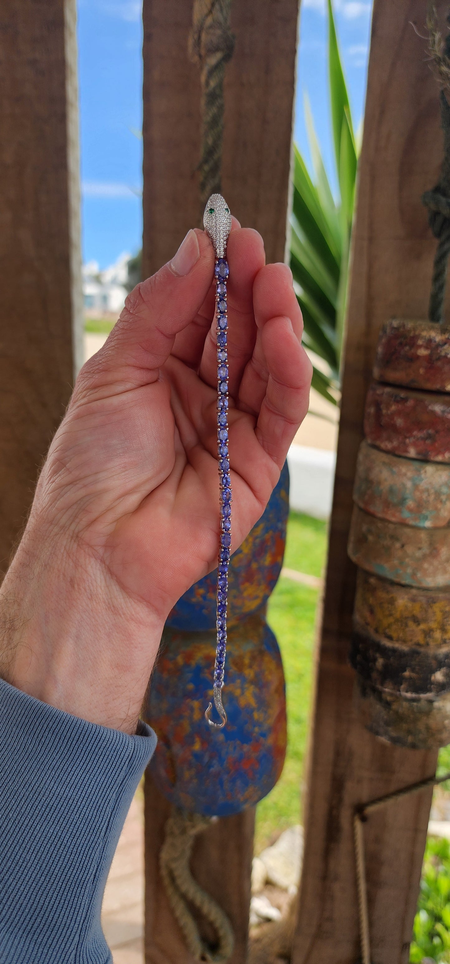 Incredible Serpent bracelet is a real piece of jewelry art! The bracelet is made of high quality Sterling Silver and Natural Oval cut Tanazanite Gemstones.