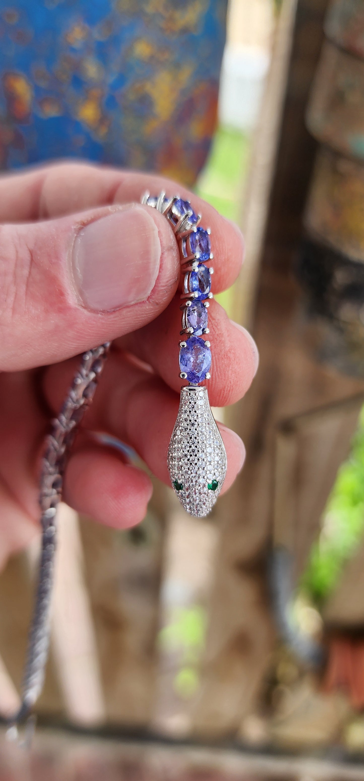 Incredible Serpent bracelet is a real piece of jewelry art! The bracelet is made of high quality Sterling Silver and Natural Oval cut Tanazanite Gemstones.