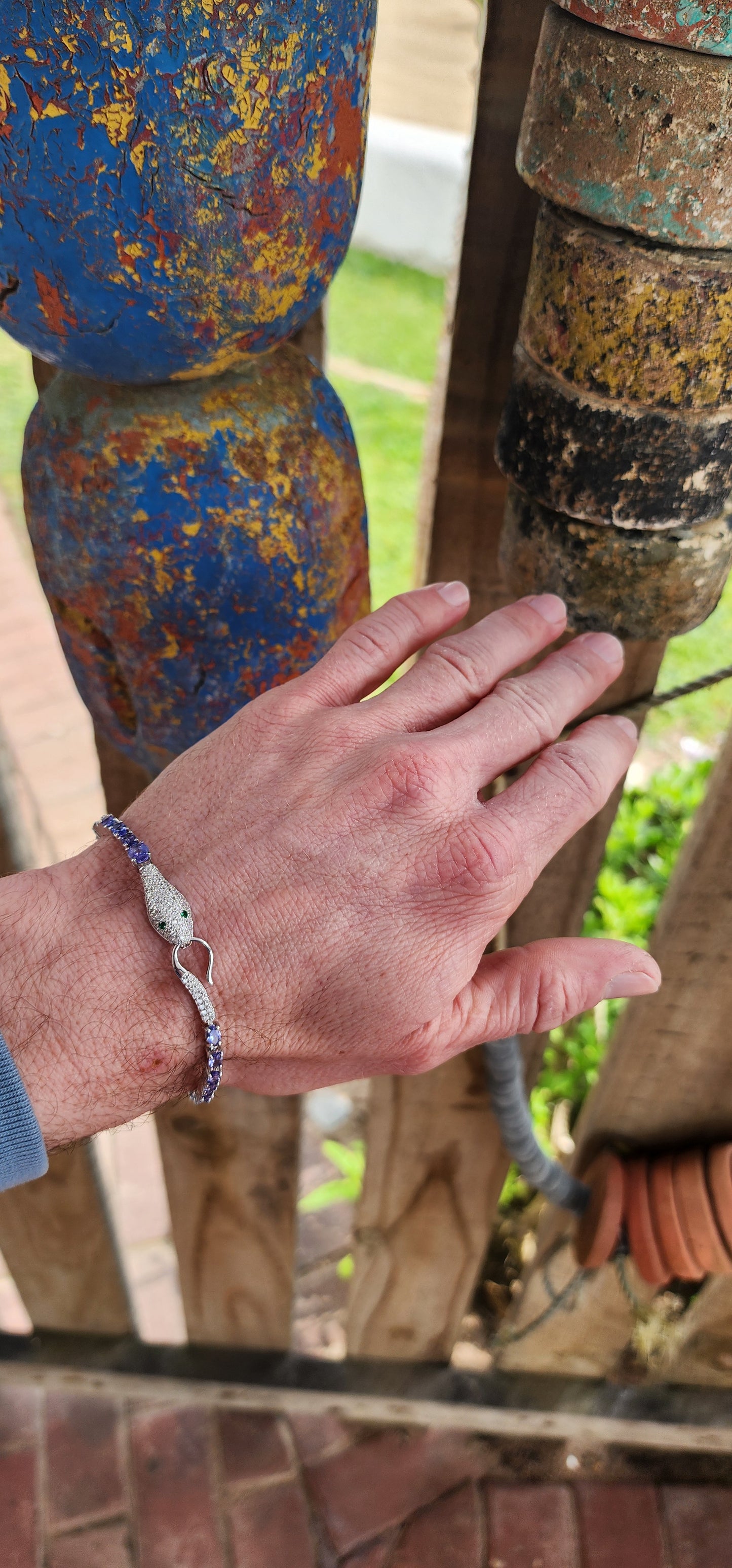 Incredible Serpent bracelet is a real piece of jewelry art! The bracelet is made of high quality Sterling Silver and Natural Oval cut Tanazanite Gemstones.